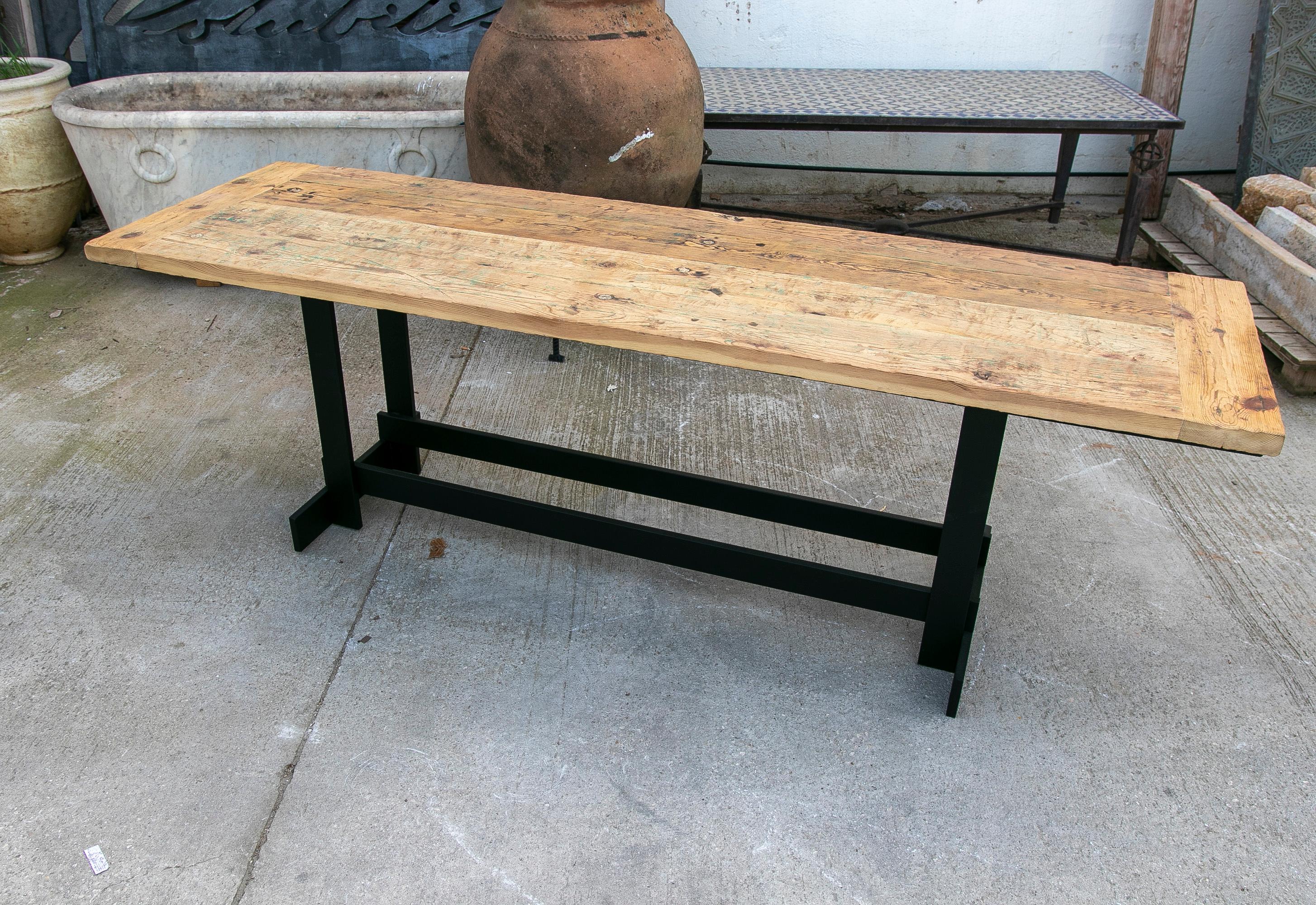 Contemporary Console Table with Iron Base and Rustic Wooden Table Top For Sale