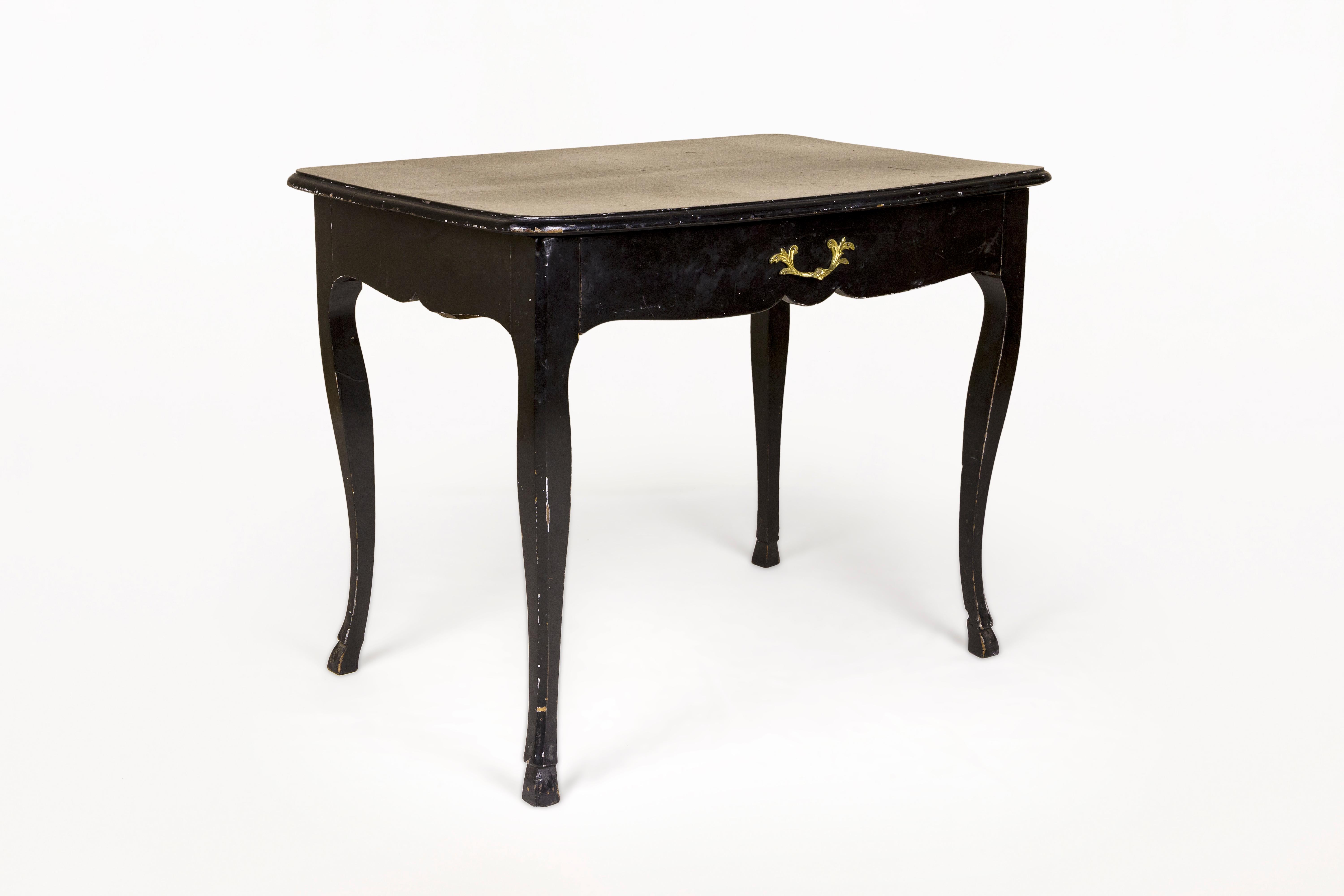 Console table, 
Made with cherry wood.
Lacquered in black.
Central drawer, with brass handle.
Carved hoof legs.
Very decorative.
XVIII Century, France
Good vintage condition.
Louis XV (in French, Louis Quinze) is an artistic style, mainly in