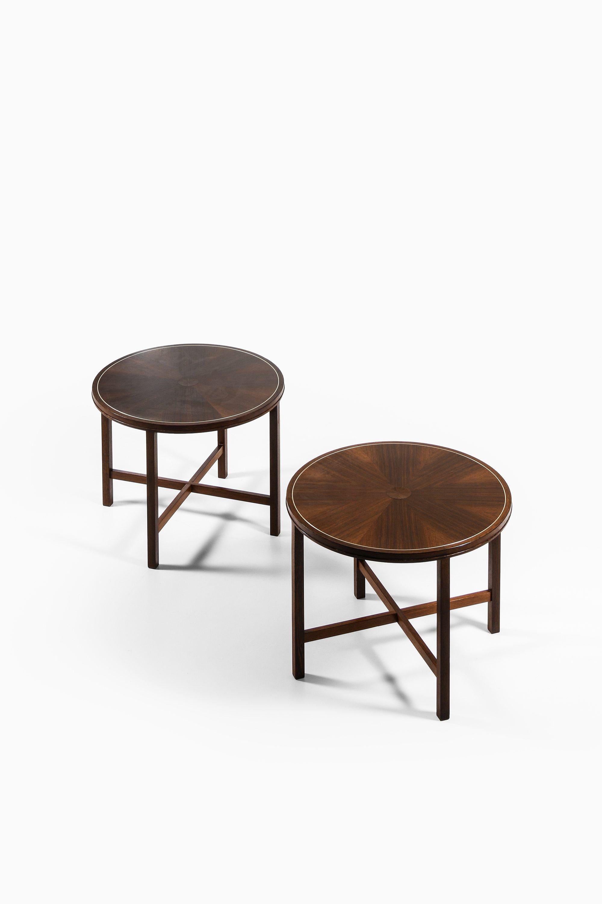 Console Tables in Wengé and Aluminium by Torsten Thorup & Claus Bonderup, 1950's

Price listed is / table.

Additional Information:
Material: Wengé and aluminium
Style: Mid century, Scandinavia
Dimensions (W x D x H): 90 x 90 x 69 cm
Condition: Good