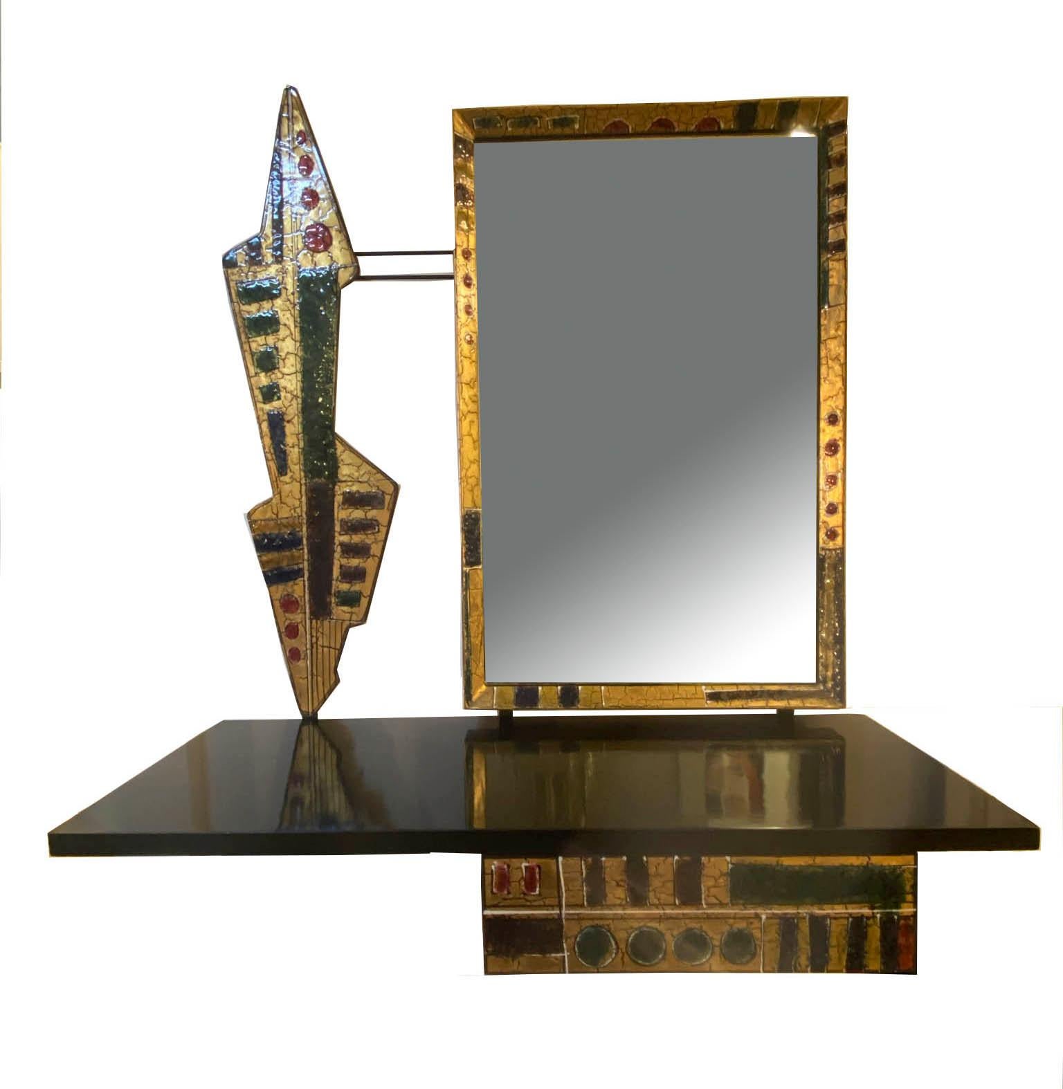 Console or dressing table with mirror, drawer and decorative elements of exquisite workmanship and extremely rare.
The shelf is glossy lacquered black, the decorations with rounded and abstract multi-color shapes are in hammered copper with an
