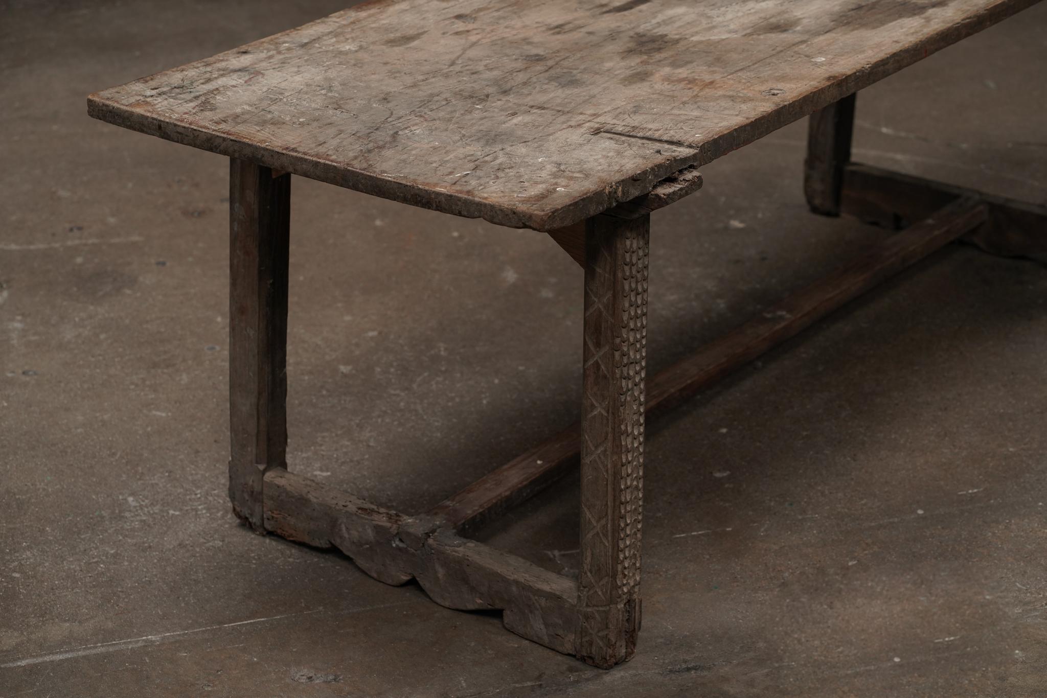 This French scalloped console features a beautiful patina with refined intricate leg detailing on the legs and base, speaking to its history and craftsmanship. This ads to the overall balance of design and function, perfect for an entryway