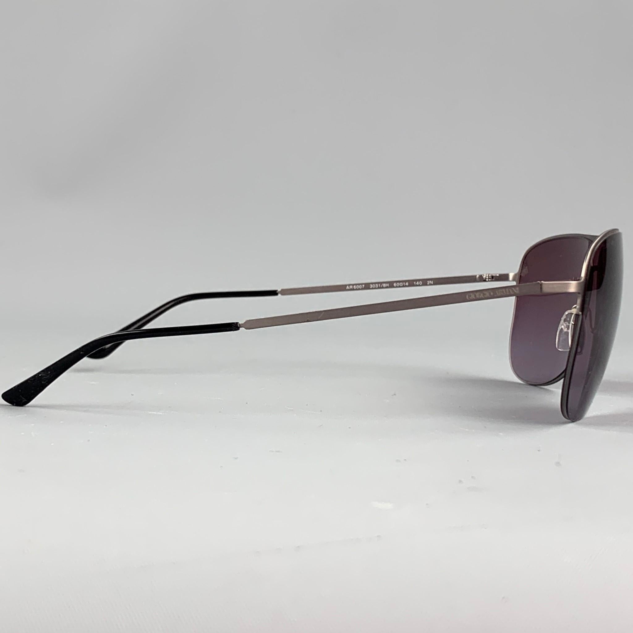 x3 sunglasses private listing 

GIORGIO ARMANI sunglasses comes in a grey metal frame featuring an aviator style and tinted lenses. Made in Italy.  Retail $280

Very Good Pre-Owned Condition.
Marked: AR 66007

Measurements:

Length: 14 cm. 
Height:
