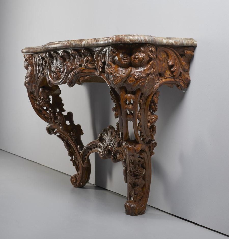 Impressive Louis XV oak console table with Rance marble top. Period first half of the 18th century.
Rare and magnificent French Louis XV console table  of the 18th century, made of oak wood, richly carved with a profusion of vine shoots and bunches