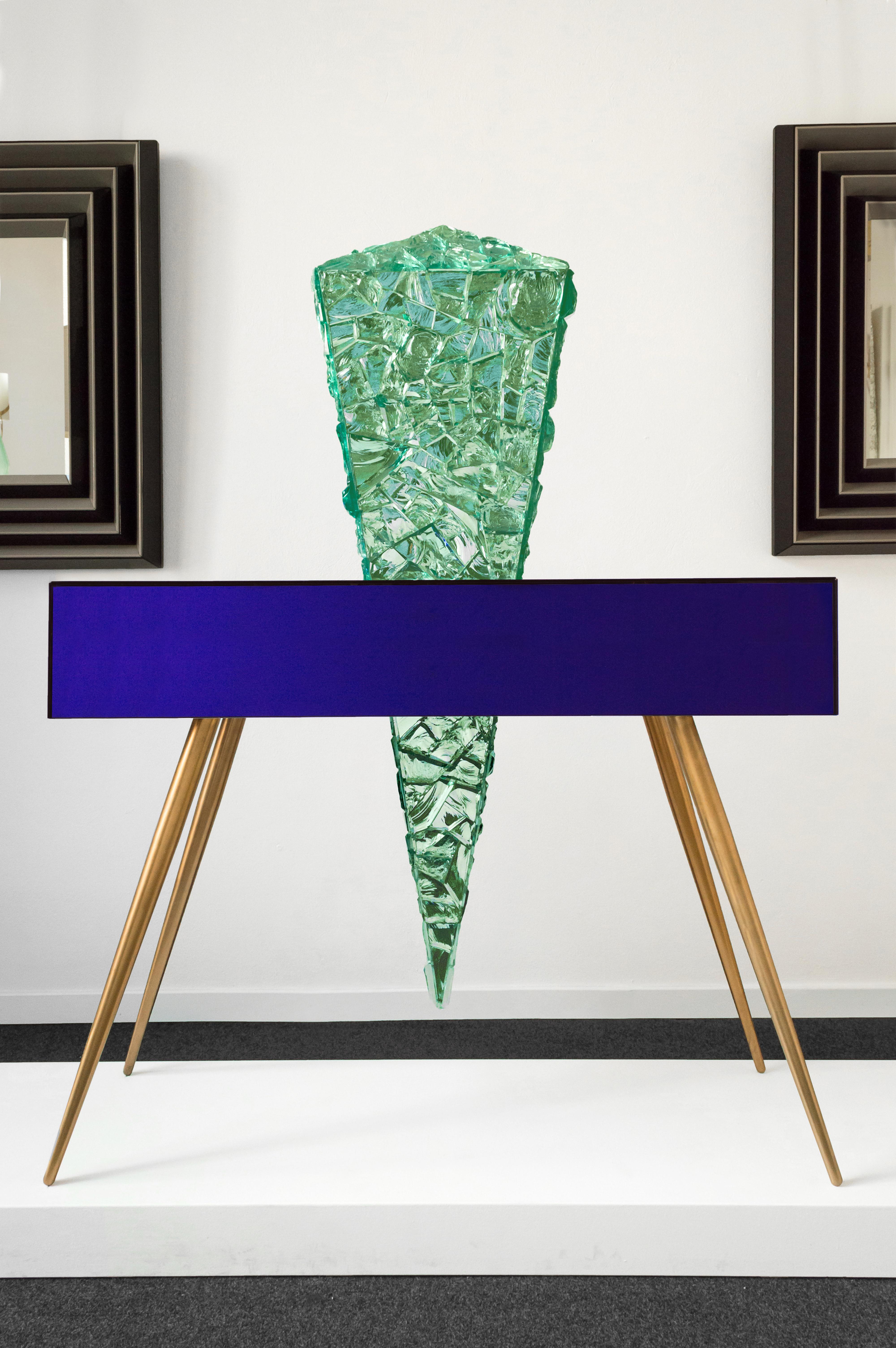 Console THE COLLECTOR by Roberto Giulio Rida

Unique and nonreplicable specimen made entirely by hand in Italy with vintage blue glass and hand-ground and shaped crystal.

This particular sculptural work by Roberto Giulio Rida is a magnificent