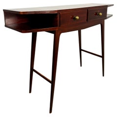 Wood and brass console table, Italy, 1950s.