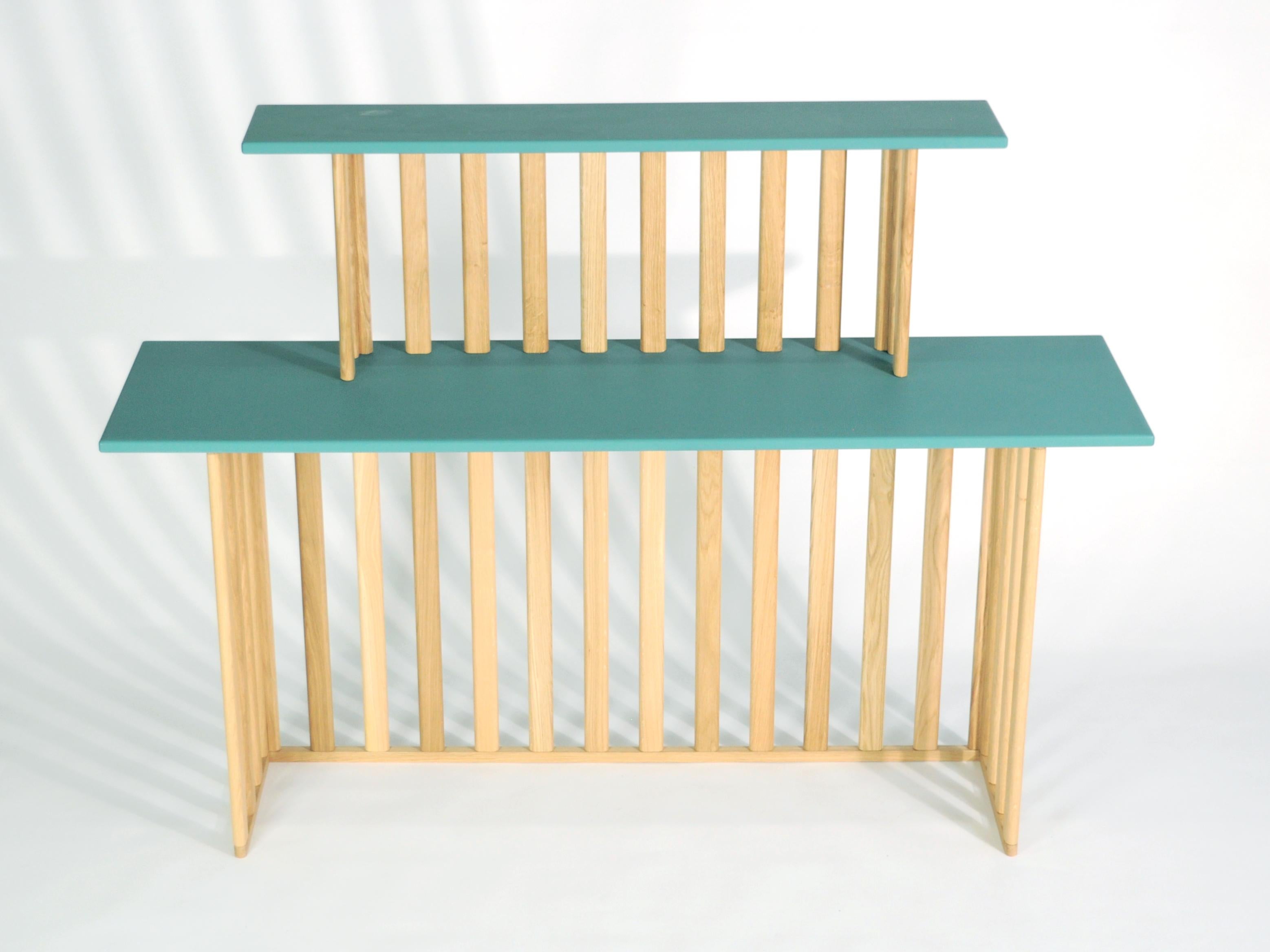 Consoles from the Lido collection. Oval shelves made of scratch-resistant lacquered MDF 19mm (0.07inch) thick, solid oak legs. Misure H72/110xW150/110xD20/40cm.
Available in a variety of combinations and sizes. Available lacquered in different