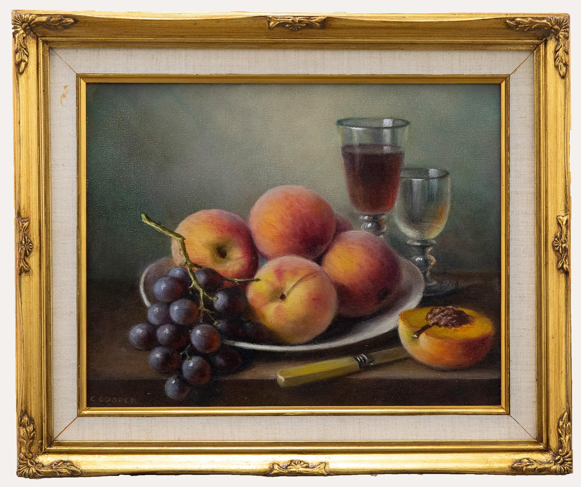 A well executed still life of fruit and wine by 20th century artist Constance Cooper. All elements of the scene have been exquisitely captured from the flesh of the fruit, to the delicate light glinting off the wine glasses. The oil has been signed