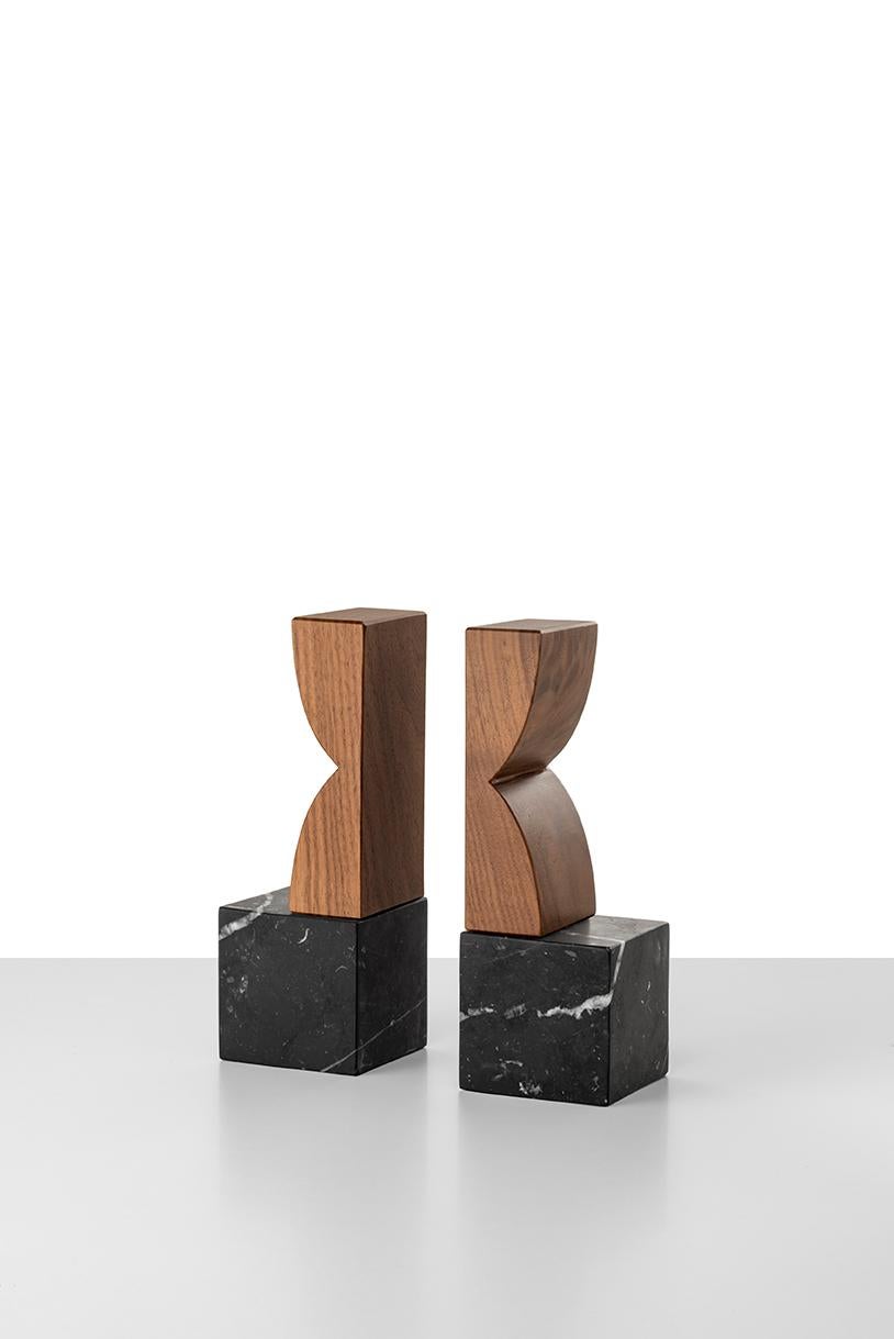 Constantin 1 is a simple but charming bookend couple with a geometric shape. The body is in Marquina black marble. The top in solid Canaletto walnut. A perfect present, closed in an elegant gift box.
Constantin collection owes its name to its