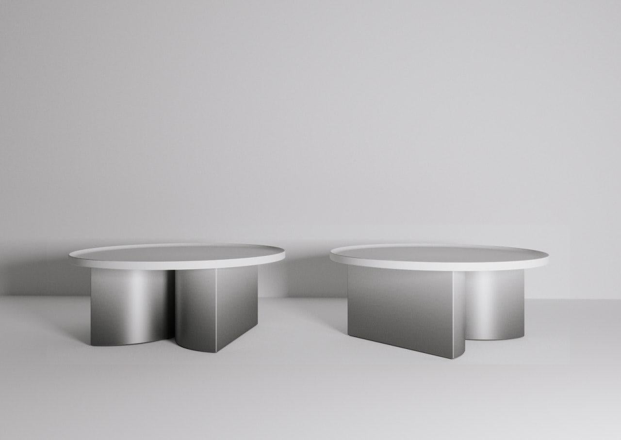 The Constantin coffee table is devoted and freely inspired by the aesthetics of sculptural work by Constantin Brâncu?i, a Romanian sculptor, painter, and photographer. The table is made out of Steel Alloys with Gradients and can be customizable upon