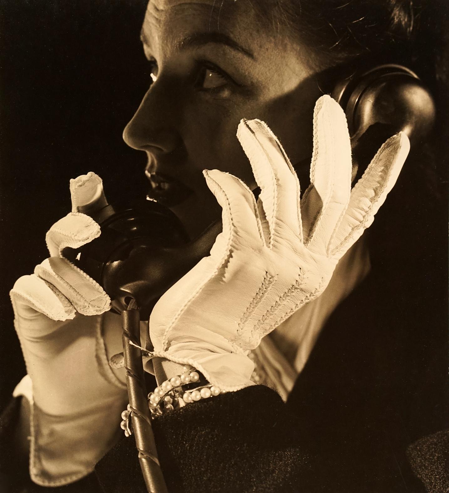 Constantin Joffe Black and White Photograph - Woman With White Gloves on Phone, 1940's