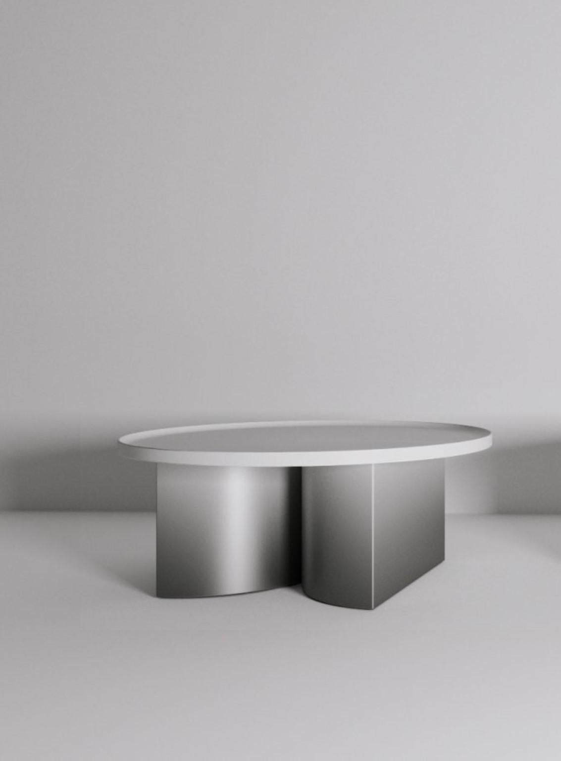 Constantin table by Jirí Krejcirík
Dimensions: 87 x 87 x 42 cm
Material: steel alloys


The tables entitled Odyssey and Kalokagathos represent the dialogue between the aesthetics of ancient Greece and the aesthetics of Slovene architect Josip