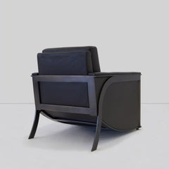 Fauteuil club Constantine avec dossier et assise tapissés de cuir par Mark Zeff