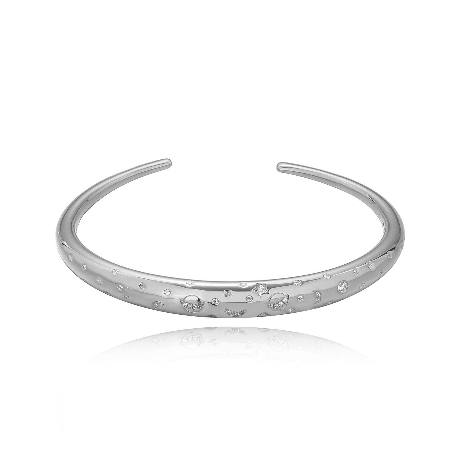 Even the starriest of us can be starstruck. This large, yet light-weight constellation dome cuff is a nod to the crystal clear night-time sky when you can see the stars and the moon abounding ... and even Jupiter. .925 sterling silver base. Also
