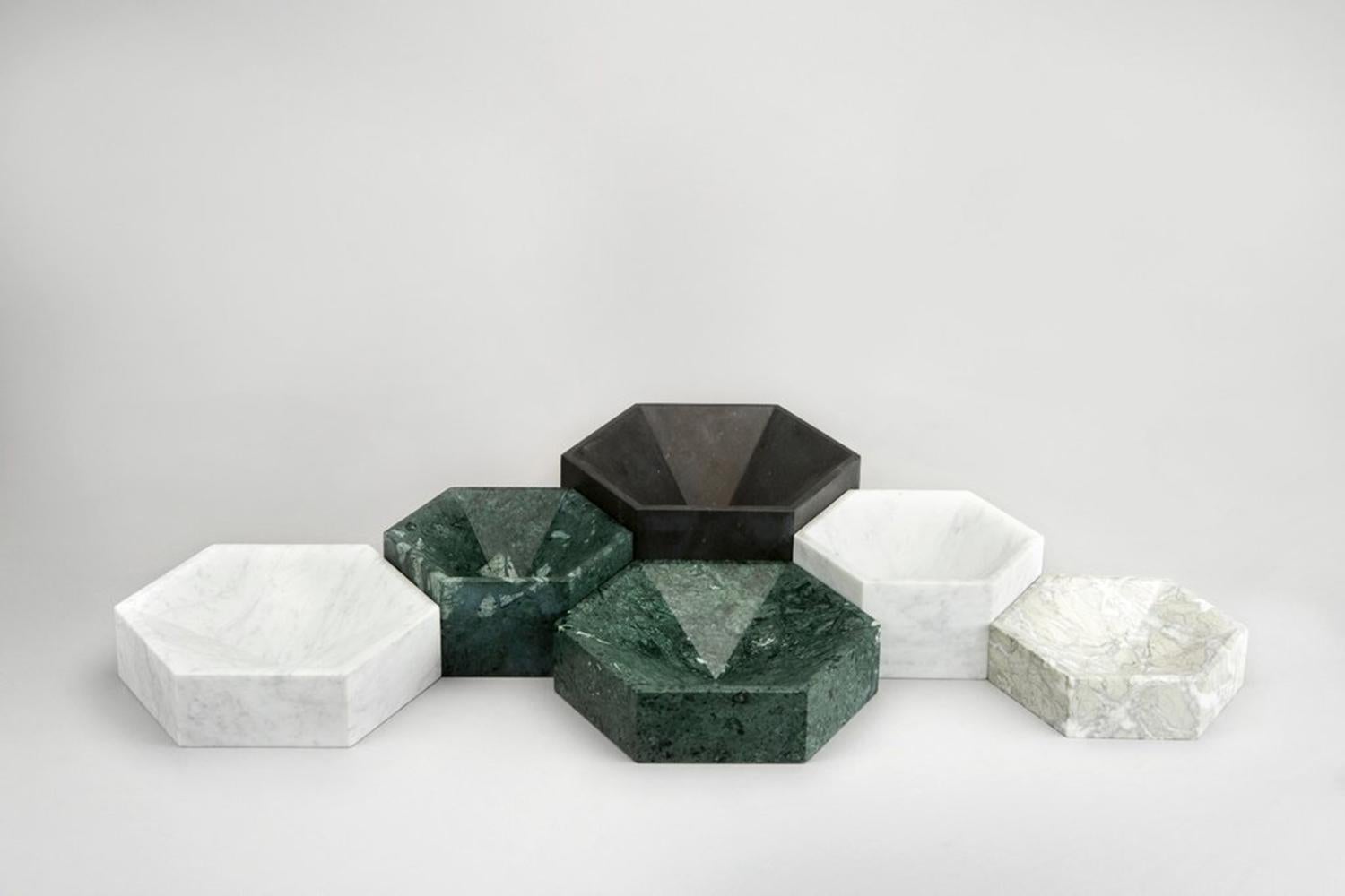 The hexagonal bowls are designed so that they can be laid together forming a honeycomb formation, either in same colour or in different colour combinations. 

Please note that no two marbles are alike and there will be variations in the pattern as