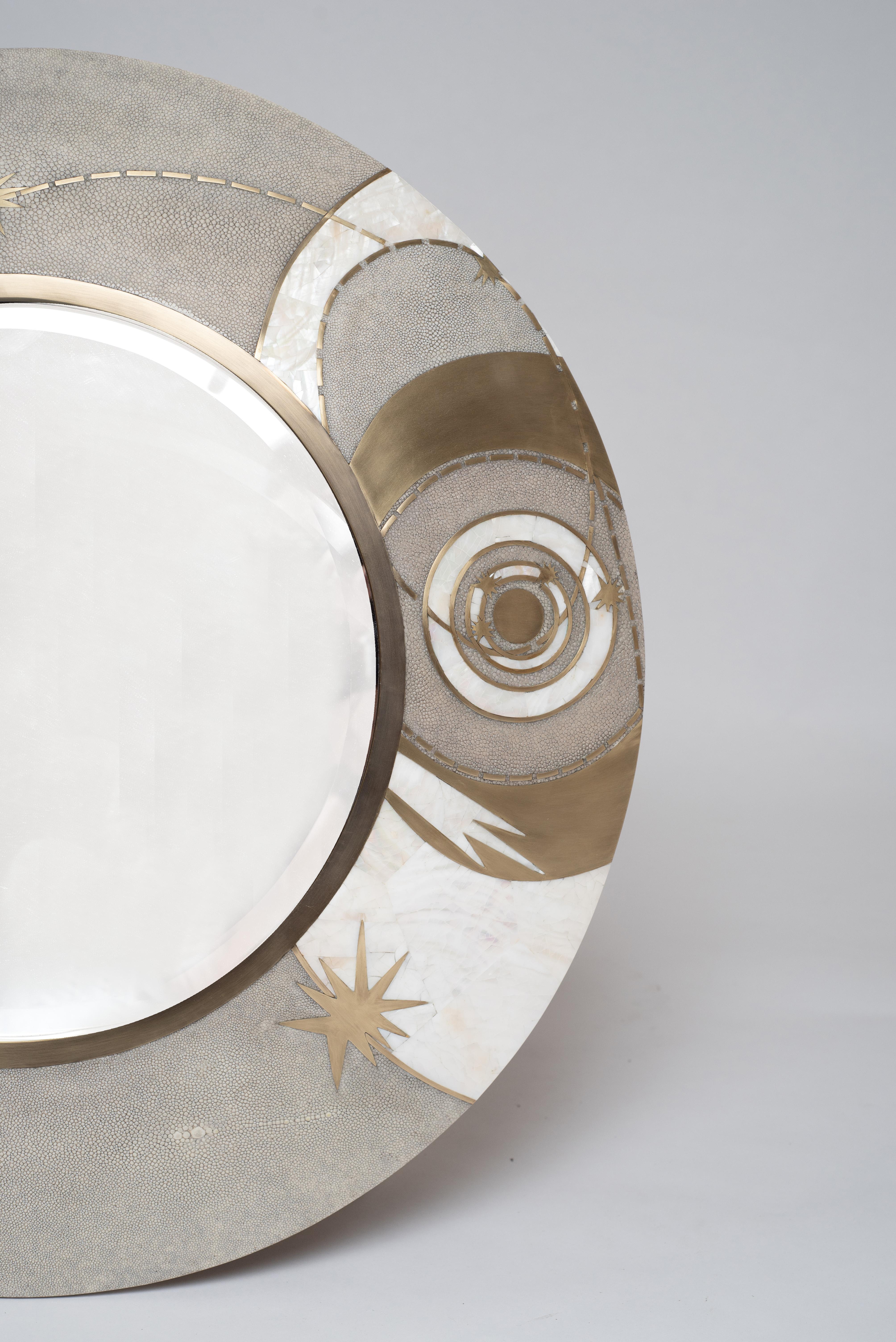 The Constellation light mirror is a statement piece with it’s celestial inspired roots. The mirror can be hung in 3 different ways. Available in a larger size and black finish (image at end of the slide). The shagreen is hand-dyed by artisans and