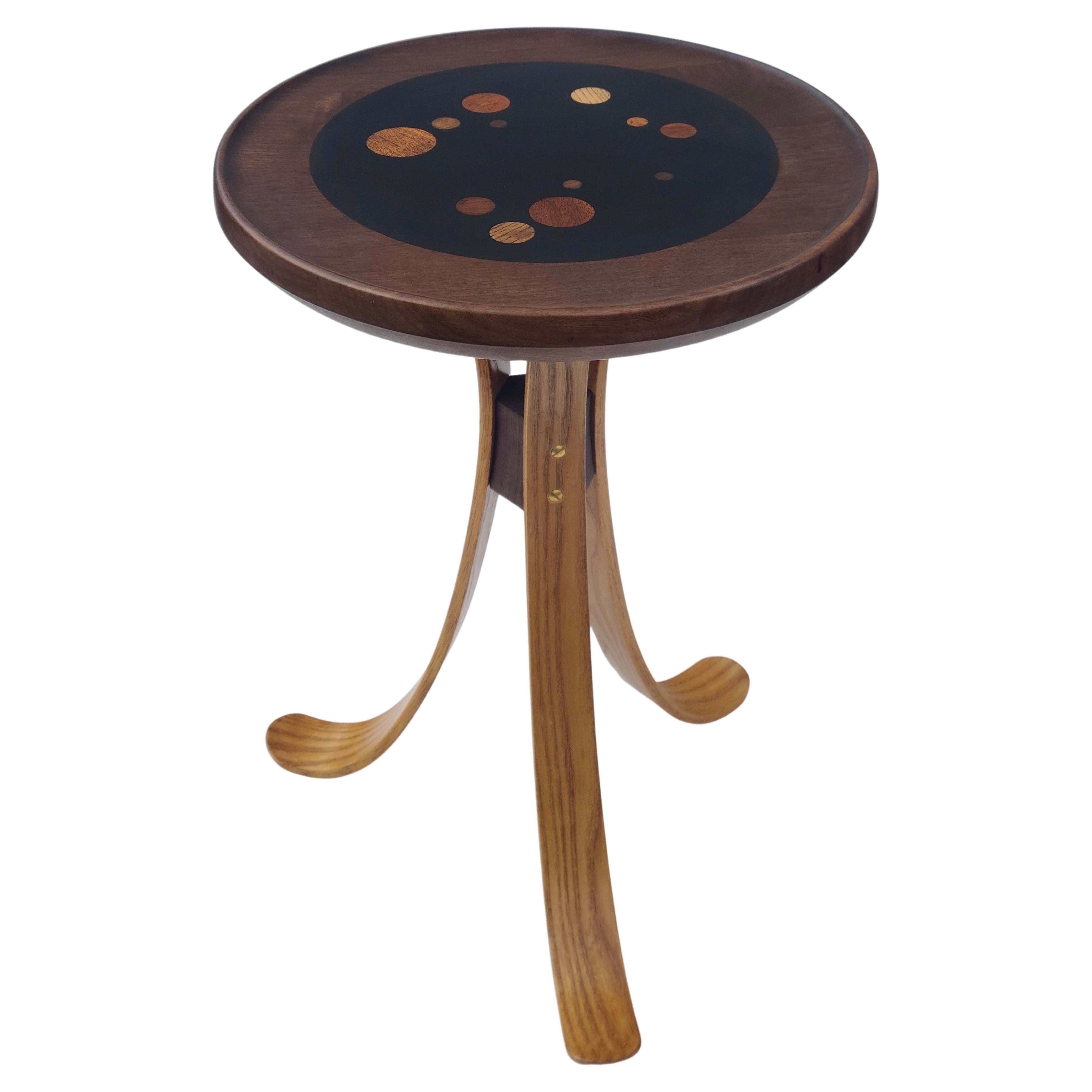 Tripod cocktail table with Constellation top.
Walnut Top. Ash legs.
Made by Indiana for Modern furniture company.
Based off of a design by Edward Wormley.
