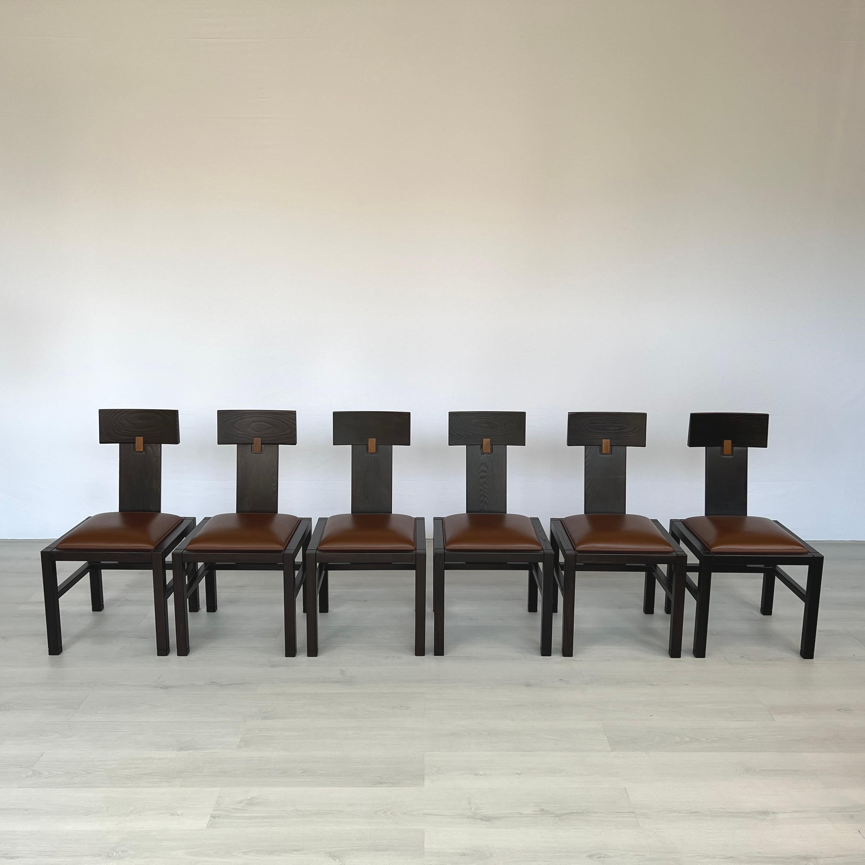Dimensions: H 35.3” x W 18.3” x D 19.7” x SH 18.7”

Set of 6 Constructivist style dining chairs by Roche Bobois. Made of solid wood with sturdy legs and seats in original brown leather.

Please see our other listings for ideas and matching