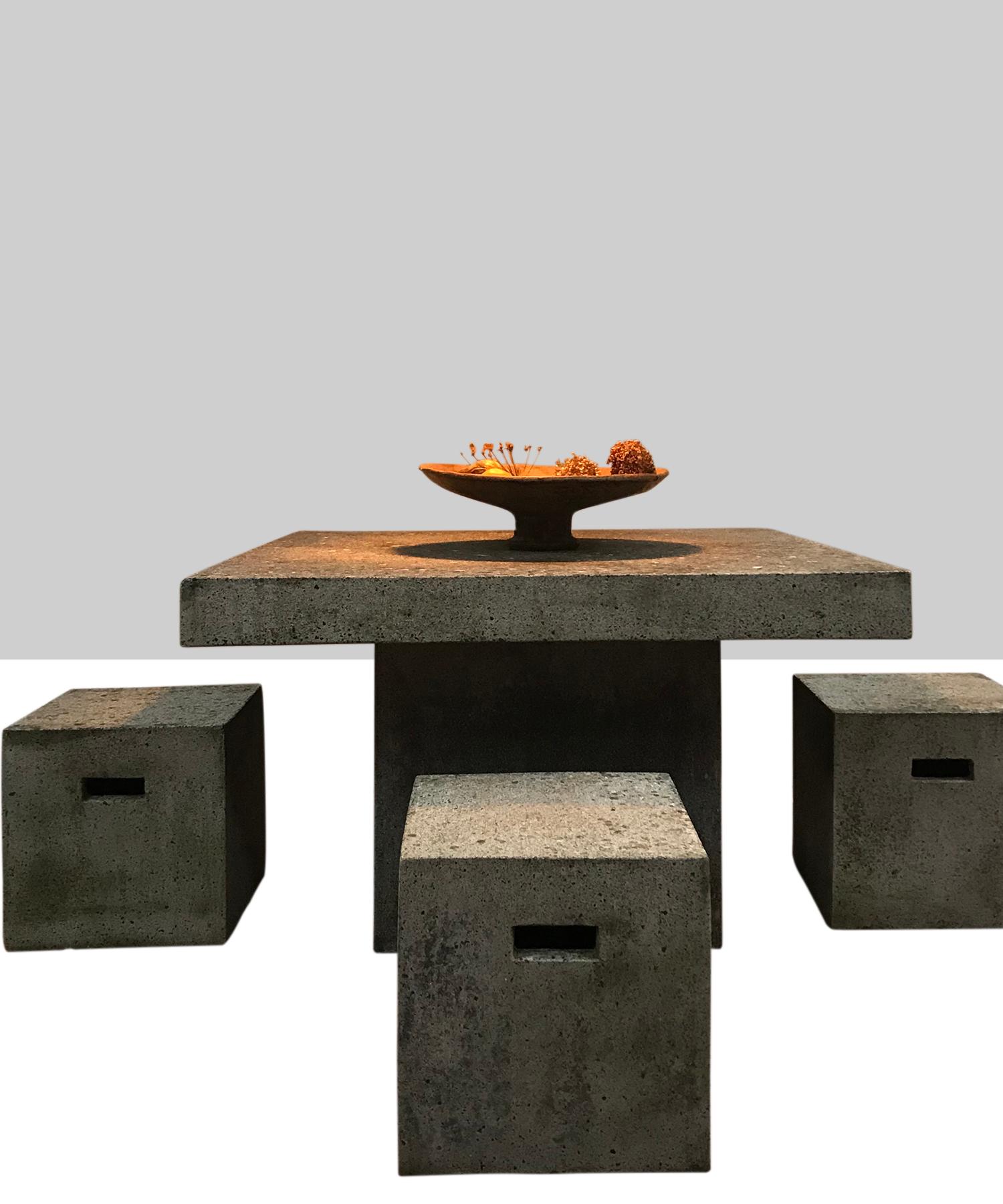 Constructivist outdoor granite table and stools set, France 1980.

Minimal square form, substantial size, wonderful patina.

Measures: 51