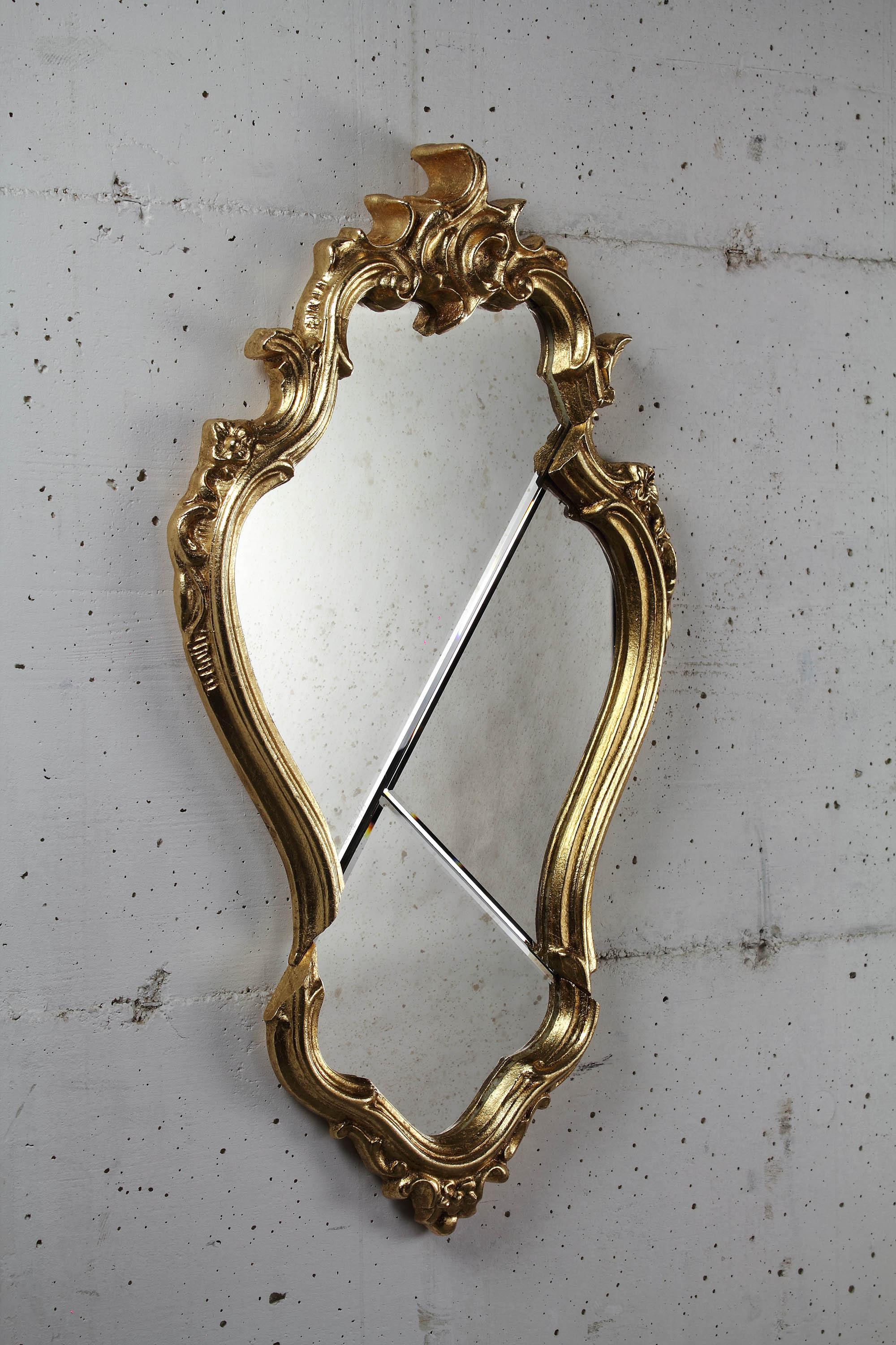 Conte Wall Mirror with Gold-Plated Wooden Frame by Barberini & Gunnell
Limited Edition of 15 + 2 AP + 1 p.
Dimensions: W 45 x H 75 cm. 
Materials: Mirror, gold-plated wood, and MDF.

Limited Edition, signed and numbered by the artists, comes with a