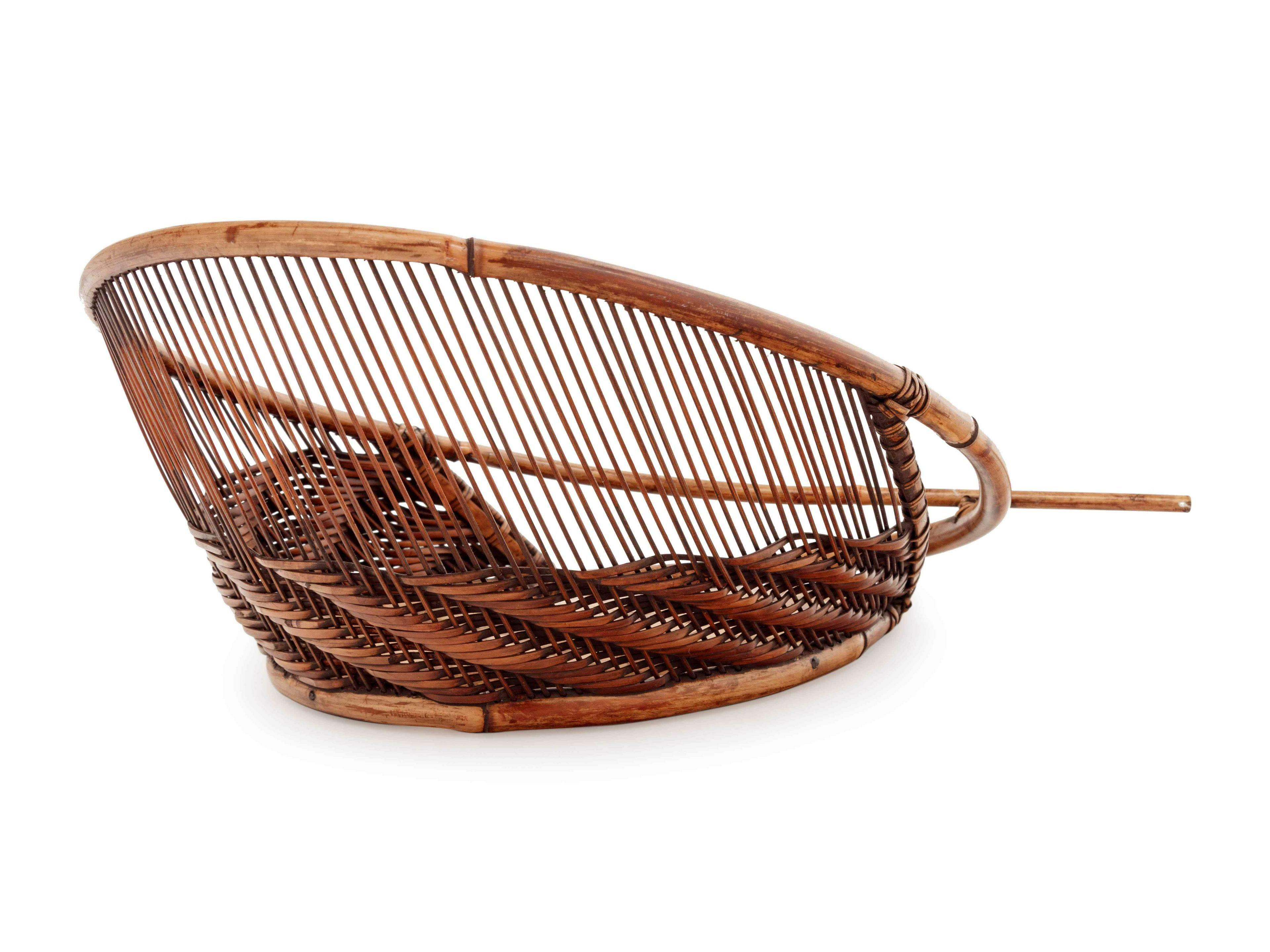 A bamboo table top sculpture by Japanese bamboo artist Honma Hideaki (b. 1959) made in early 2000s. The basket form sculpture was a creative ikebana and could be used as such or simply as a okimono (decorative piece). The piece is of an unusual oval