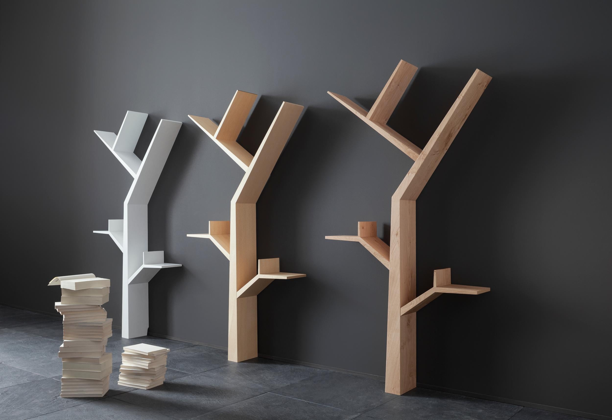 Booktree is a bookcase for your home, a natural presence growing on the wall. It can live alone but prefers to host on its branches books, varius objects and memories, with silency delicacy. Entirely made on solid wood, Booktree brings a unique