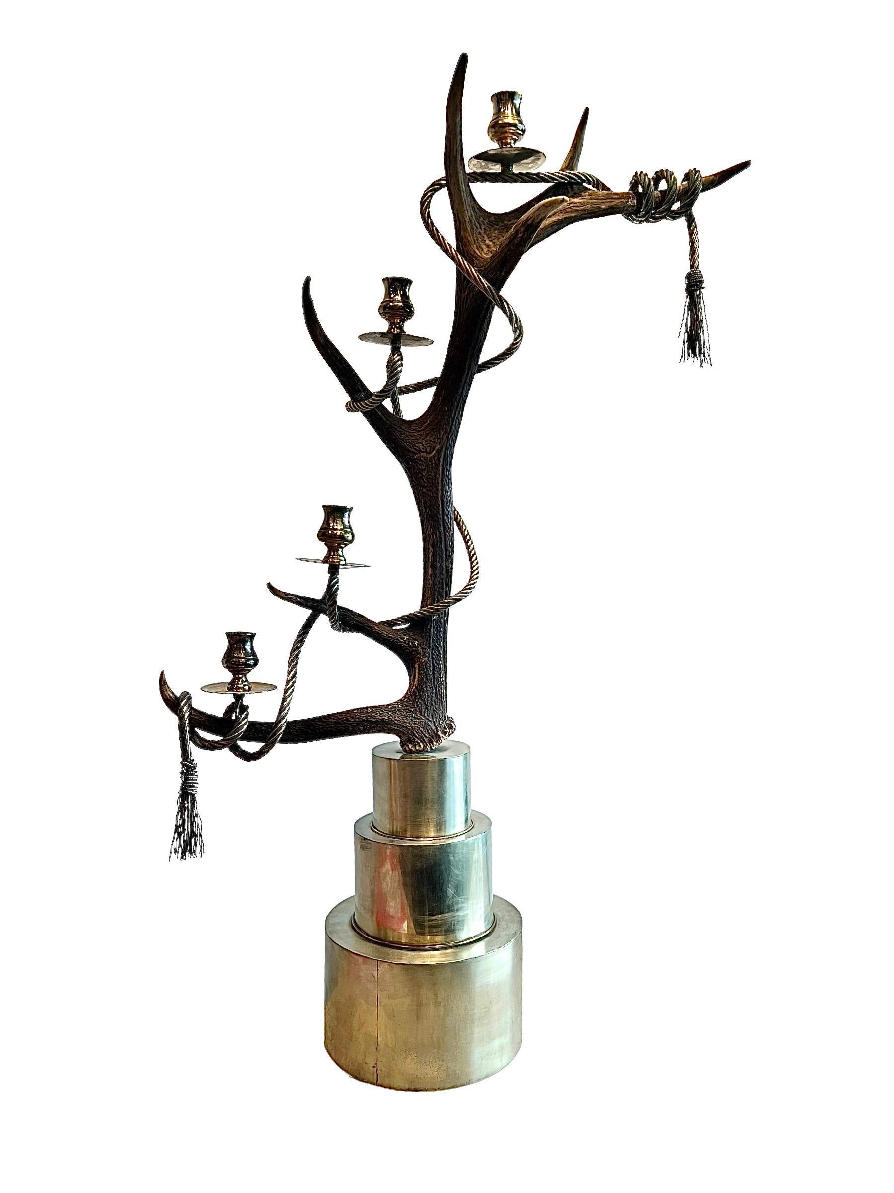 Prepare to be captivated by an extraordinary and fantastical duo of antler candelabra, masterfully transformed into unique art pieces by the visionary artist Anthony Redmile. These remarkable creations are a bold fusion of nature's beauty and