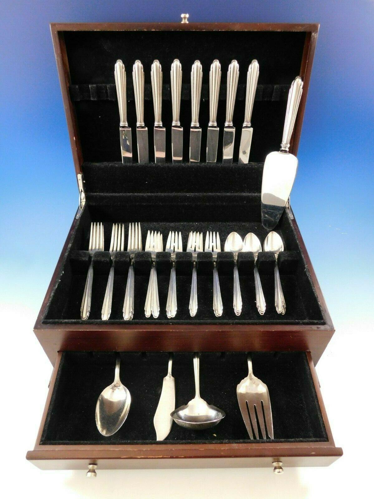 Art Deco Contempora by Dominick & Haff sterling silver flatware set - 37 pieces. This set includes:

8 knives, 8 3/4