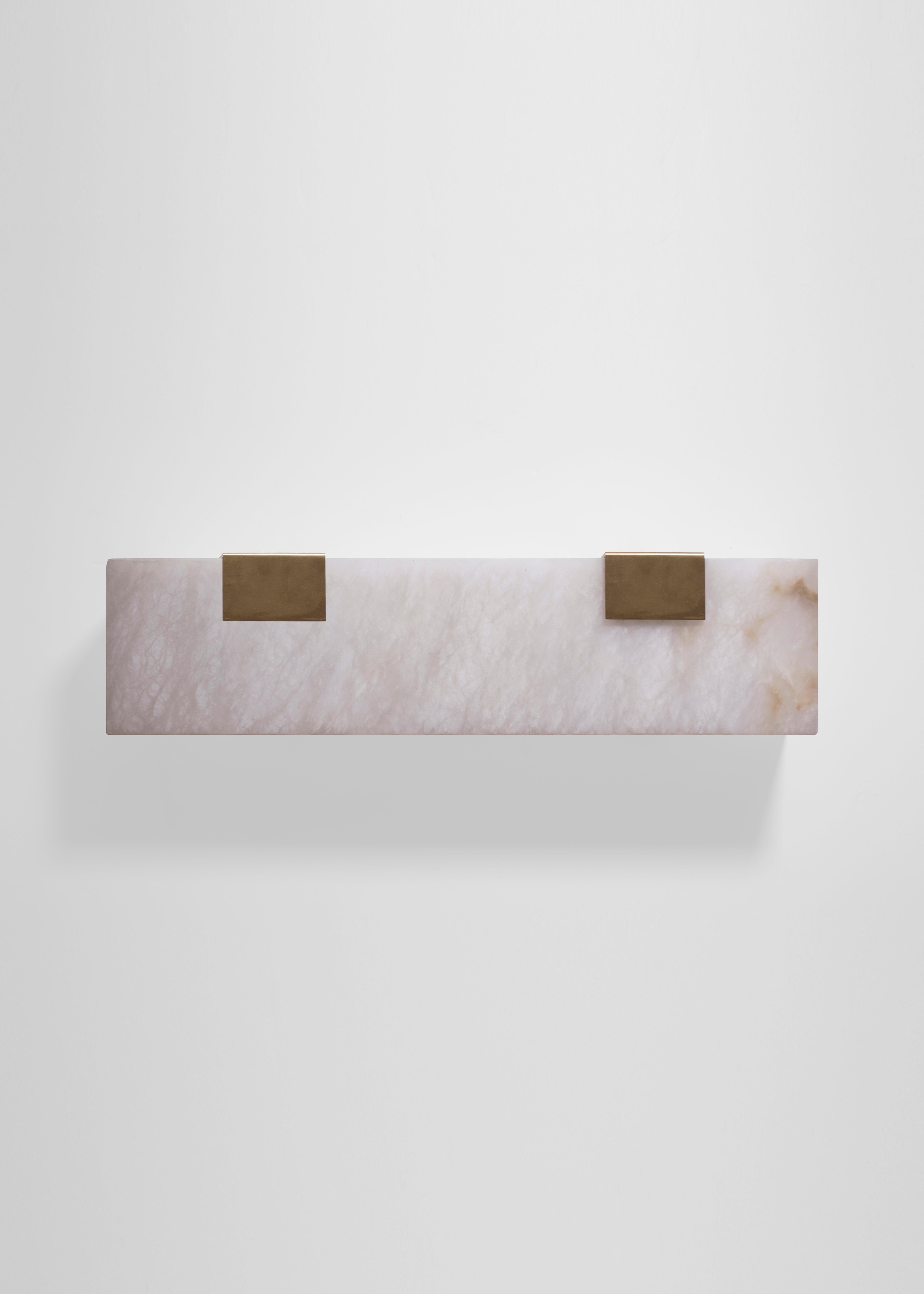 Orphan Work 003-2C Sconce, 2018
Shown in brushed brass and alabaster
Available in brushed brass, brushed nickel and blackened brass
Measures: 5 1/4”H x 19”W x 3 7/8”D
Wall or ceiling mount
Vertical or horizontal
Plug-in by request
1-4 adjustable