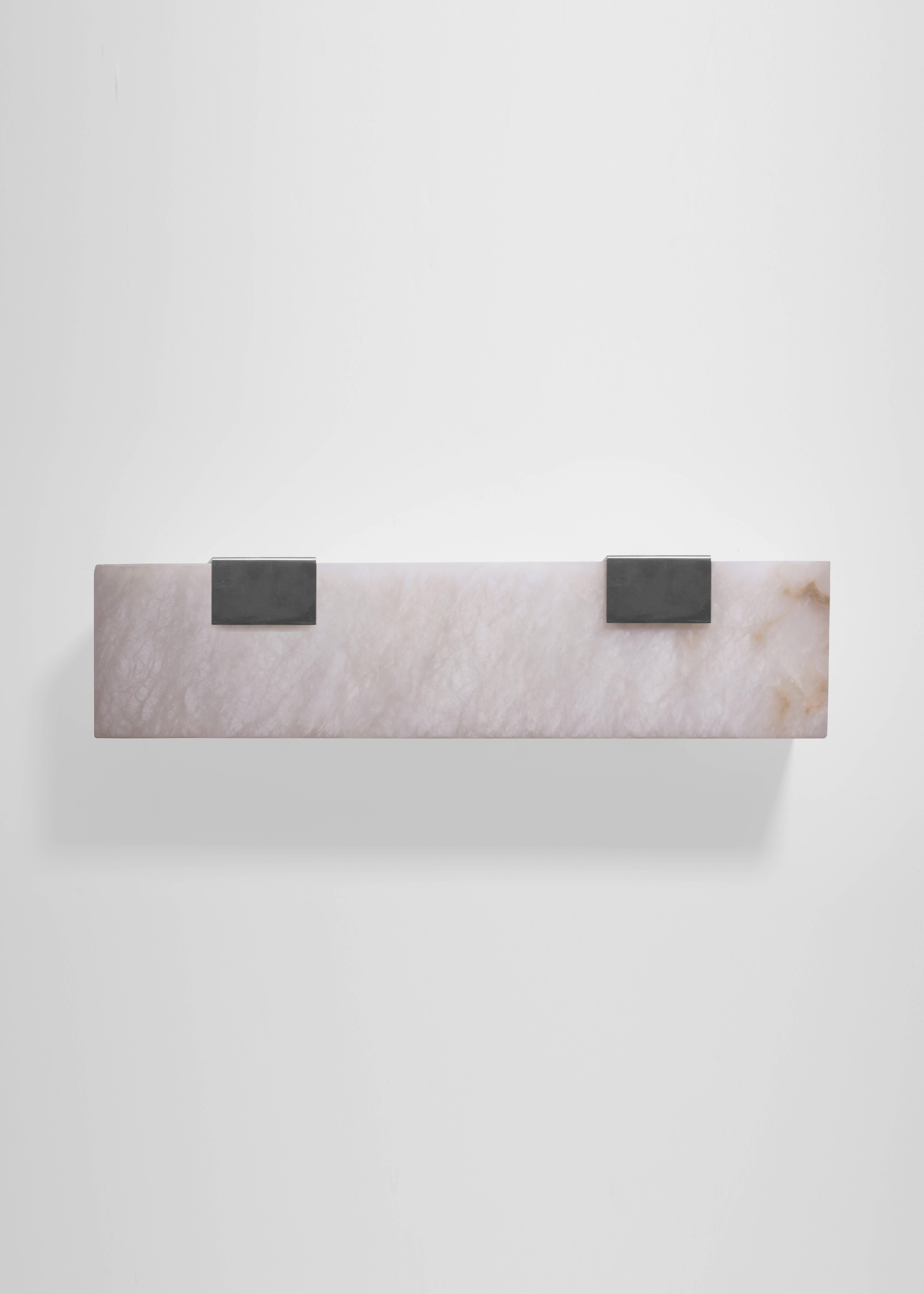 Orphan Work 003-2C Sconce, 2018
Shown in brushed nickel and alabaster 
Available in brushed brass, brushed nickel and blackened brass
Measures: 5 1/4”H x 19”W x 3 7/8”D
Wall or ceiling mount
Vertical or horizontal
Plug-in by request 
1-4 adjustable