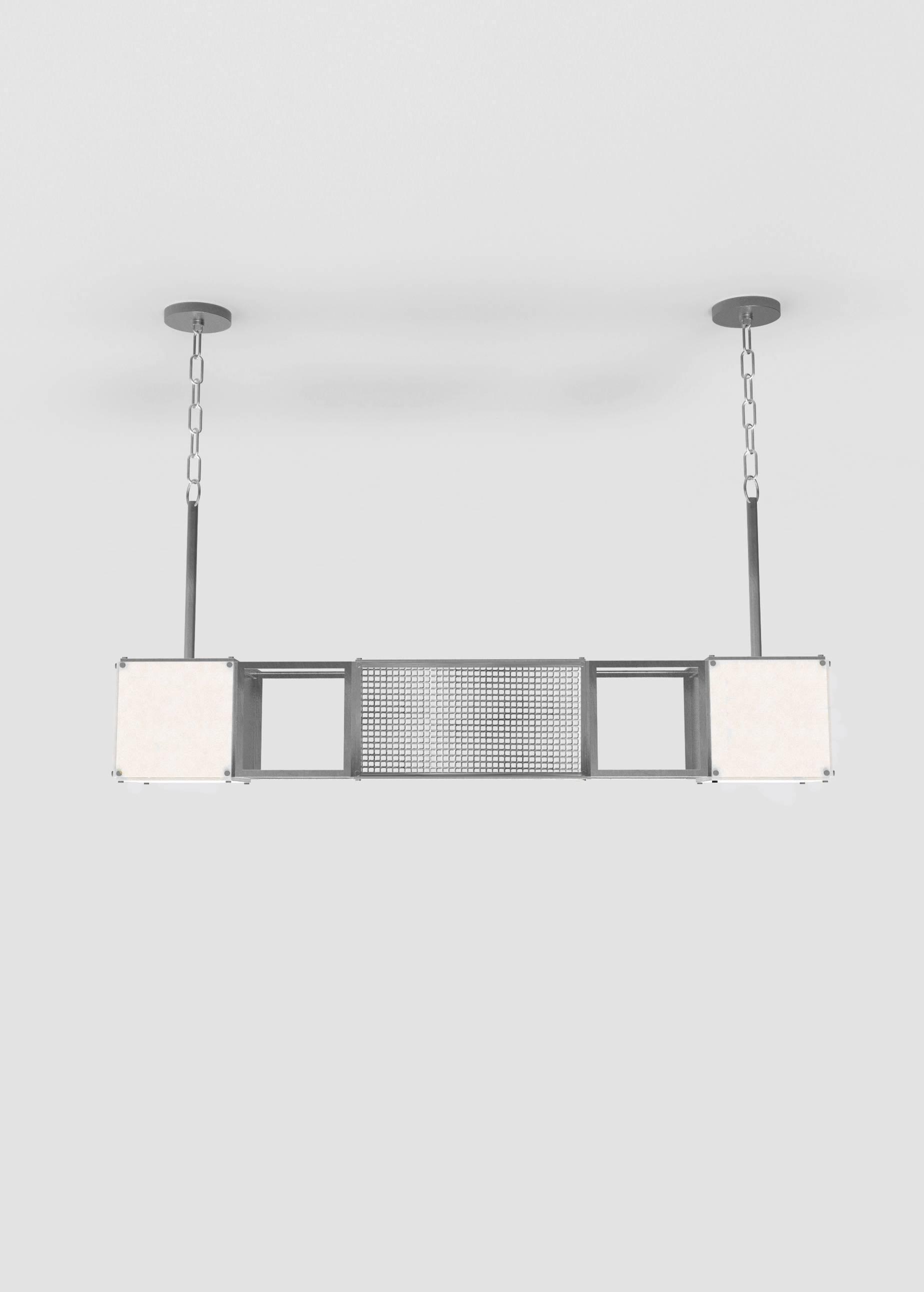 This contemporary light made of brushed nickel and alabaster is part of the Orphan Work brand and can be used as a horizontal or vertical ceiling pendant. 

ORPHAN WORK is a new identity for lost designs from Material Lust’s own archive. We have