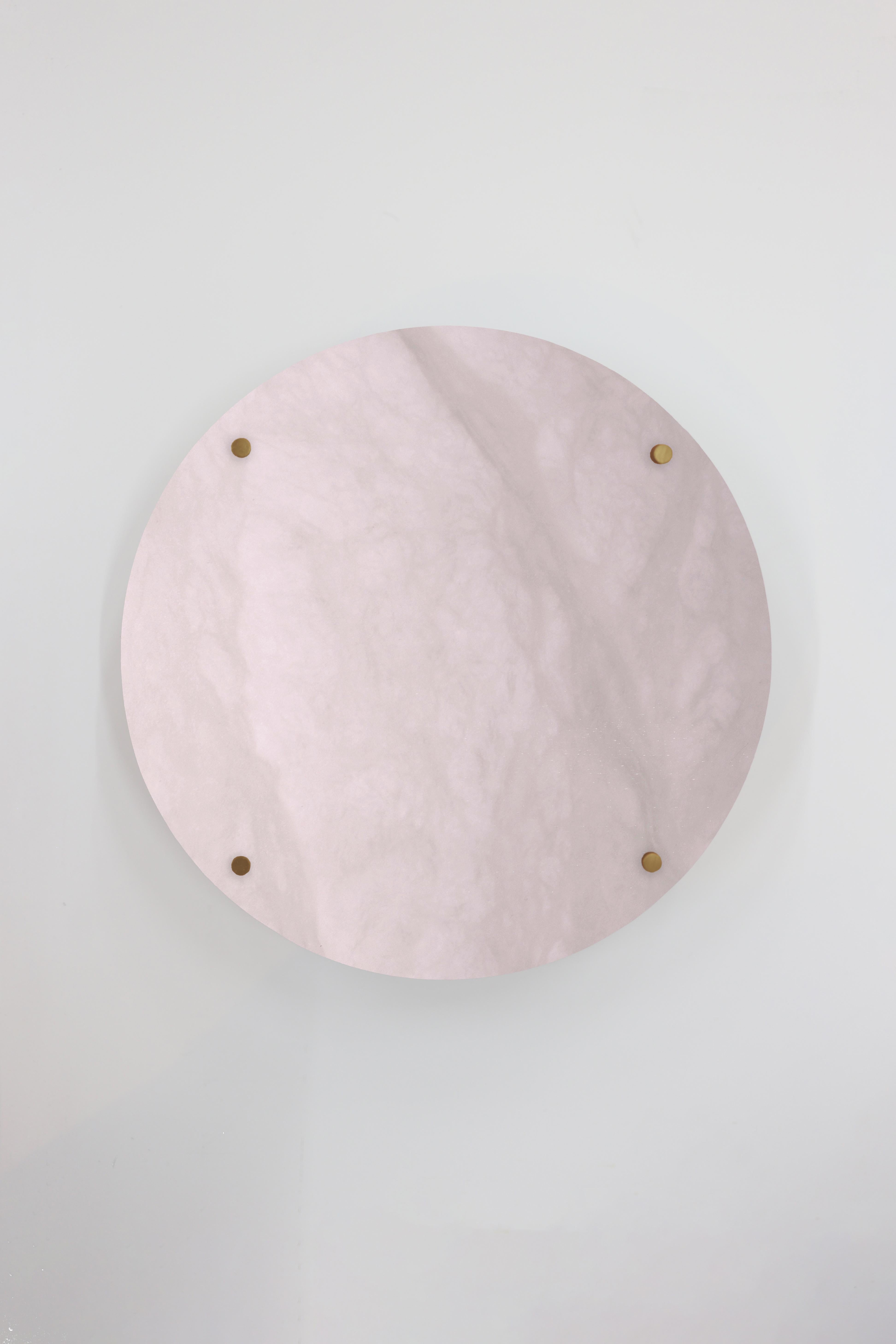 Orphan Work 102A Sconce
Shown in alabaster with brushed brass.
Available in brushed brass, brushed nickel and blackened brass.
Measures: 13” diameter x 3 5/8” depth (Back 9” H x 9” W)
Wall or ceiling mount
Vertical or horizontal
Plug-in by