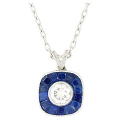 Contemporary 0.25ct Diamond and Sapphire Target Pendant