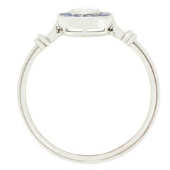 Contemporary 0.25ct Diamond and Sapphire Target Ring