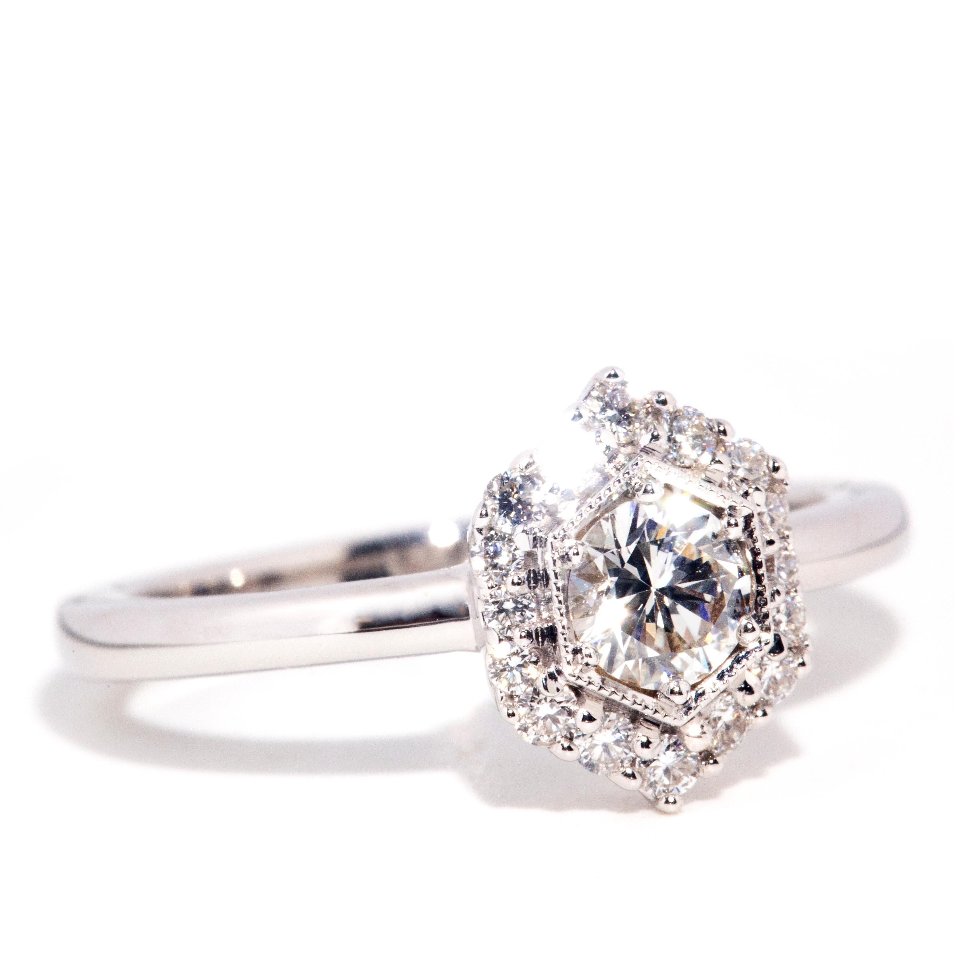 Round Cut Contemporary 0.54 Carat Diamond 18 Carat White Gold Hexagonal Halo Cluster Ring