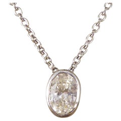 Contemporary 0.55ct Oval Diamond Rub Over Pendant on 18ct White Gold Chain