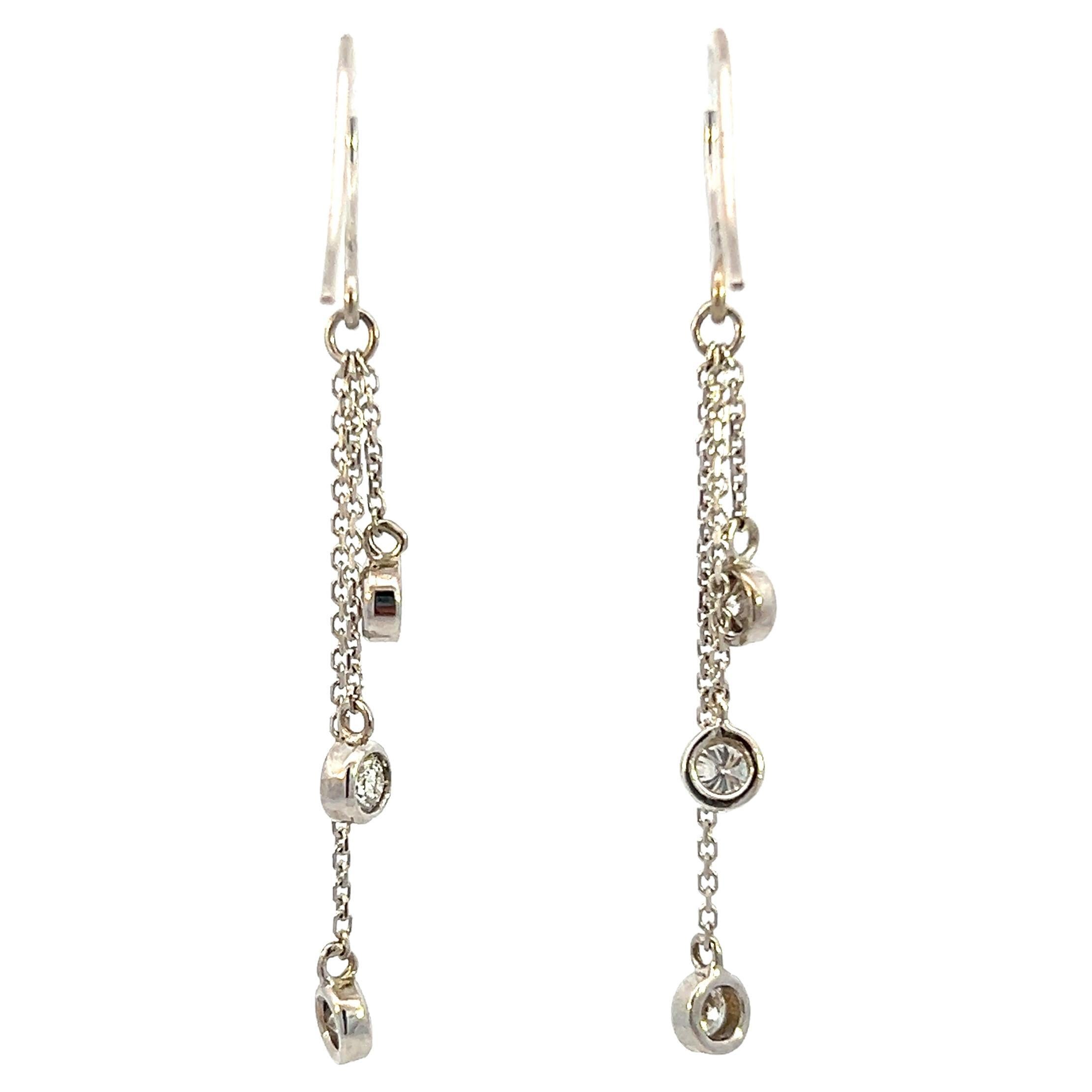 Contemporary 0.60 TCW Round Brilliant Diamond and White Gold Dangle Earrings