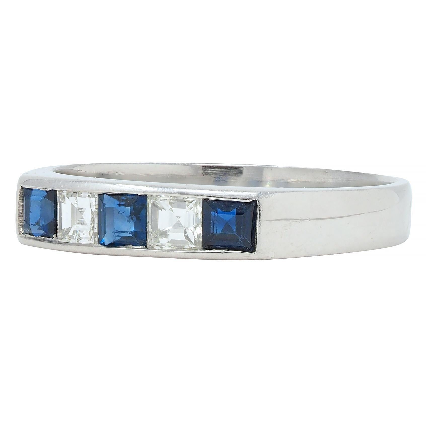 Featuring square step cut sapphires and diamonds alternating in pattern
Sapphires weigh 0.40 carat total - transparent dark blue in color
Diamonds weigh 0.23 carat total - G color with VS2 clarity
Channel set to front with sloped shoulders
With high