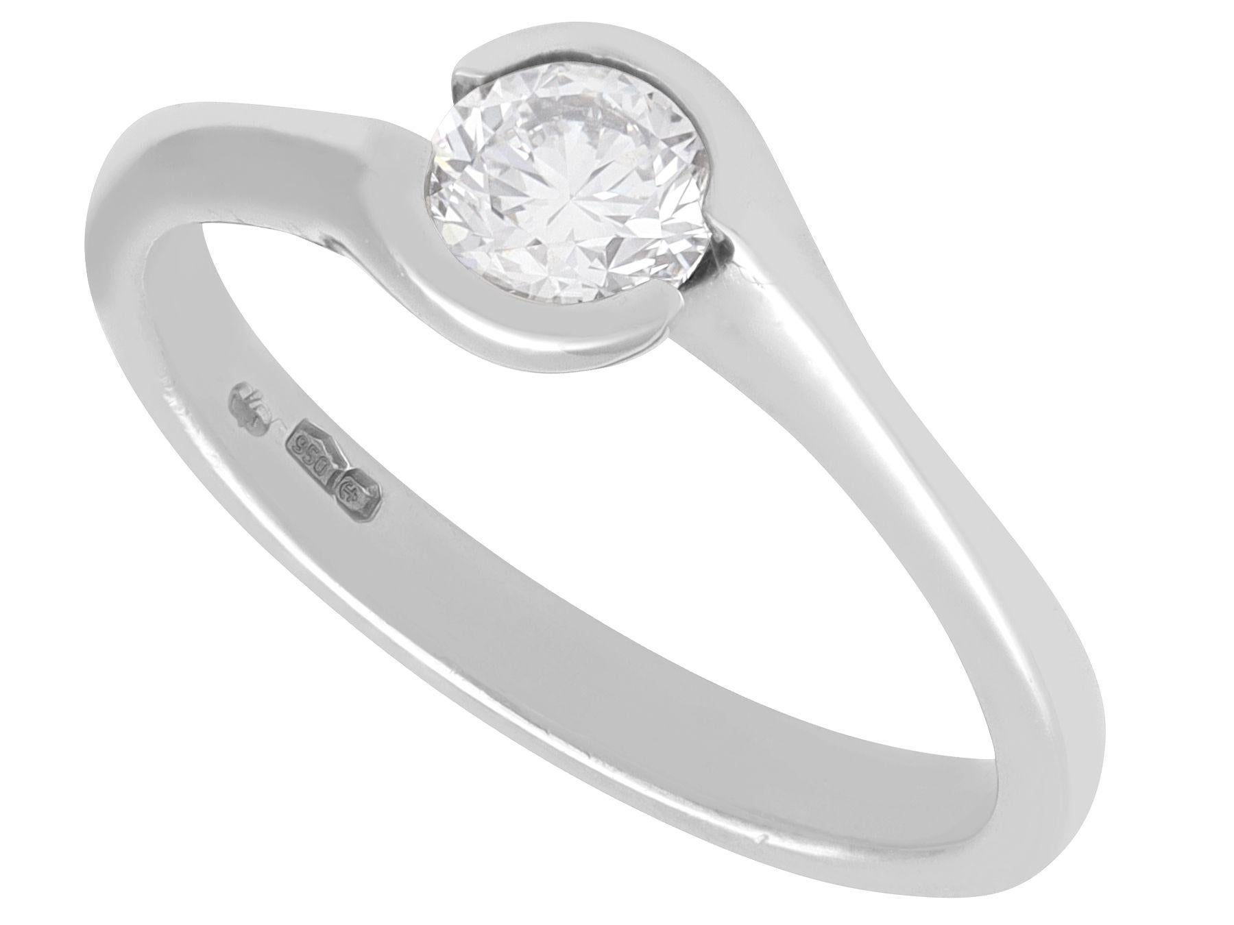 Round Cut Contemporary GIA Certified 0.65 carat Diamond and Platinum Ring and Wedding Band For Sale