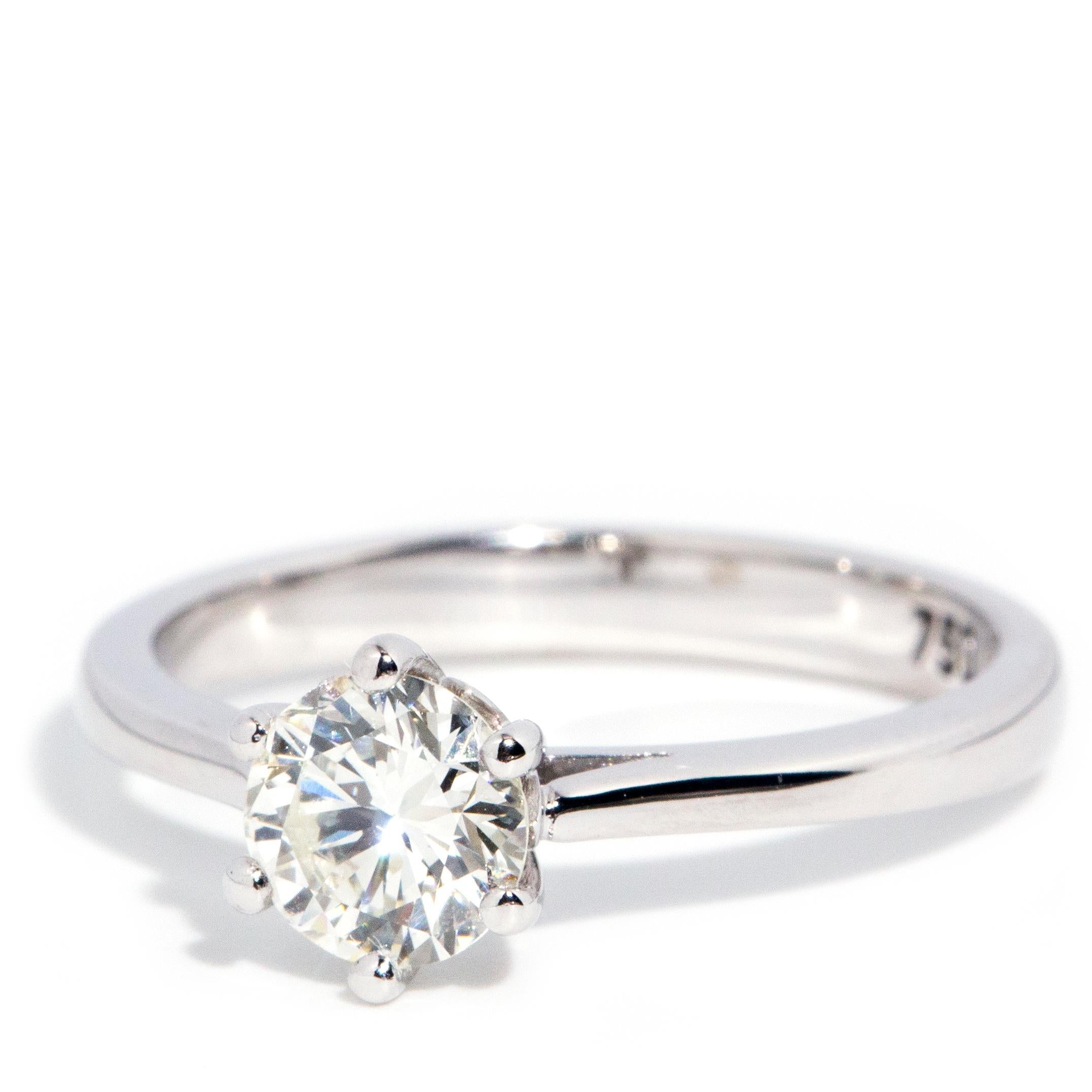 Round Cut Contemporary 0.66 Carat Solitaire Diamond Engagement Ring 18 Carat White Gold For Sale