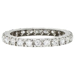 Bague d'éternité Contemporary 0.72 CTW Diamond Platinum Scrolling Dollar Sign Eternity Band