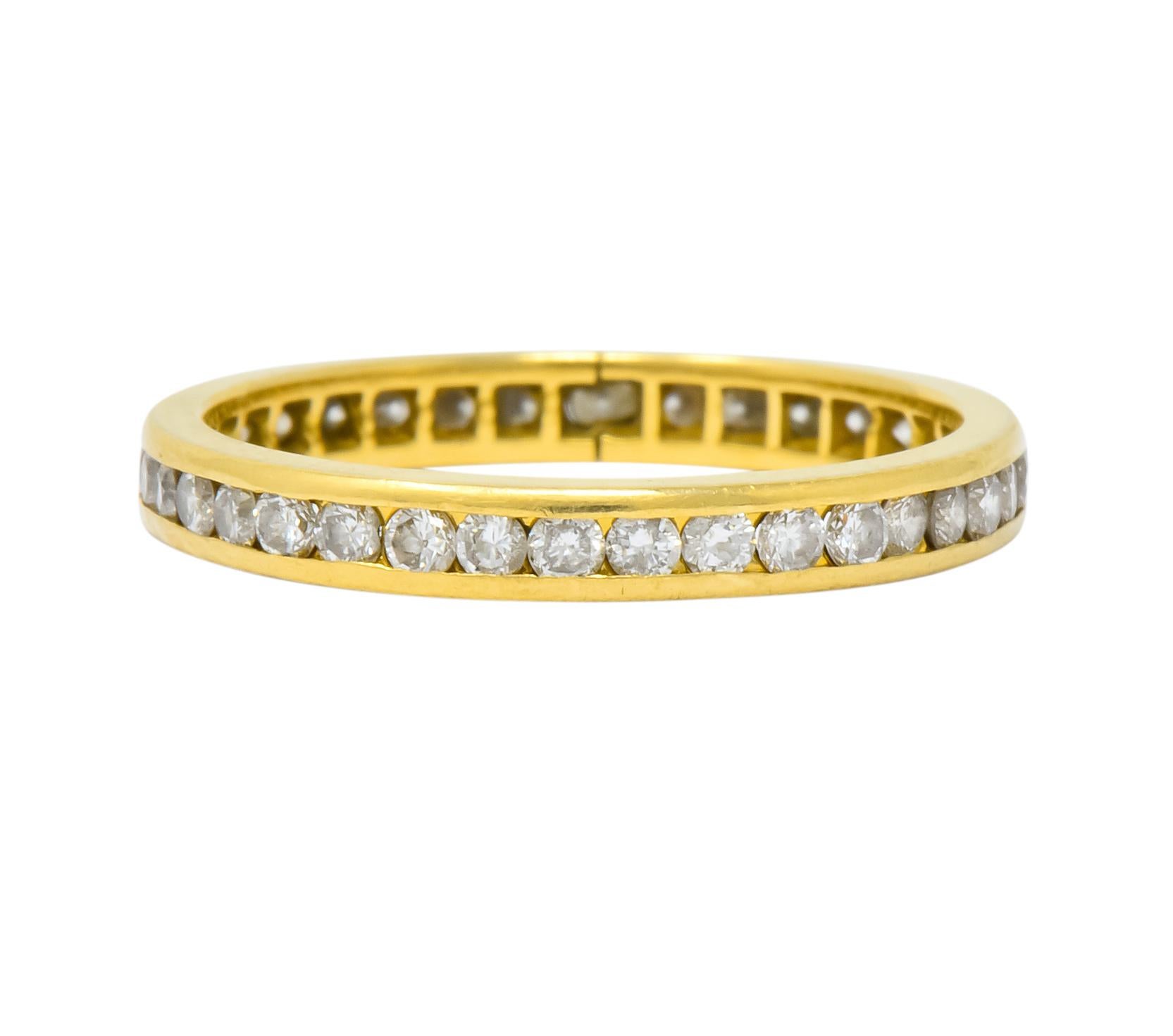 Set all the way around with round brilliant cut diamonds

Thirty-six diamonds total, weighing approximately 0.75 carat, H/I color and SI to I clarity

Channel set

Tested as 14 karat gold

Ring Size: 4 1/2 & Not Sizable

Top measures 2.4 mm and sits