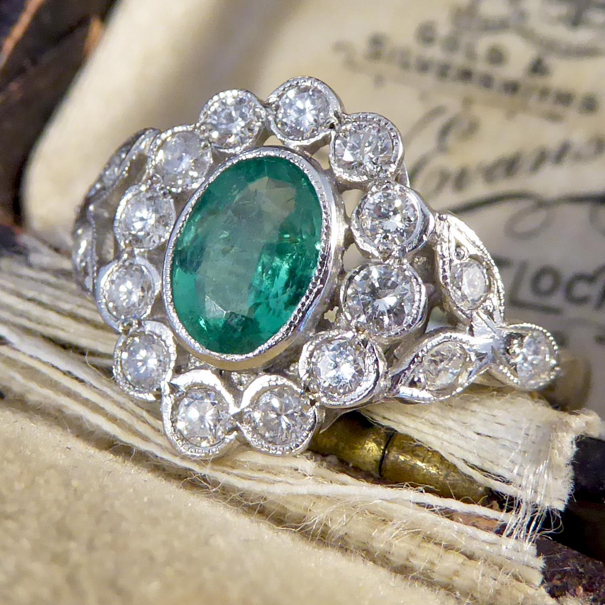 Contemporary 0.75ct Emerald and Diamond Cluster Ring with Shoulders in Platinum 3