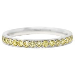 Contemporary 0.85 Carat Yellow Diamond Platinum Band Ring