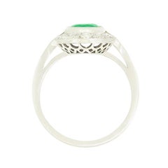 Contemporary 0.85ct Emerald and Diamond Cluster Ring