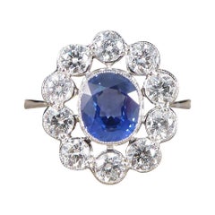 Contemporary 0.90 Carat Sapphire and 1.50 Carat Diamond Cluster Ring in Platinum