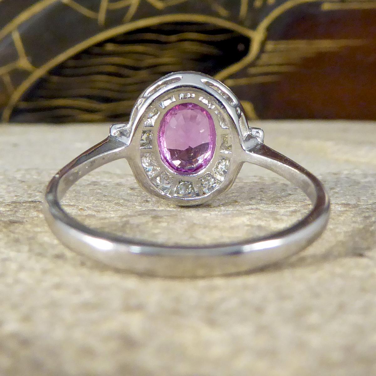 Oval Cut Contemporary 0.95ct Pink Sapphire and Diamond Cluster Ring Mounted in Platinum