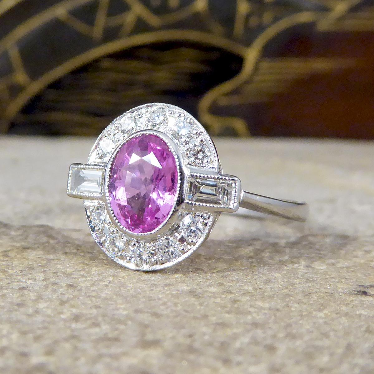 Contemporary 0.95ct Pink Sapphire and Diamond Cluster Ring Mounted in Platinum In Good Condition In Yorkshire, West Yorkshire