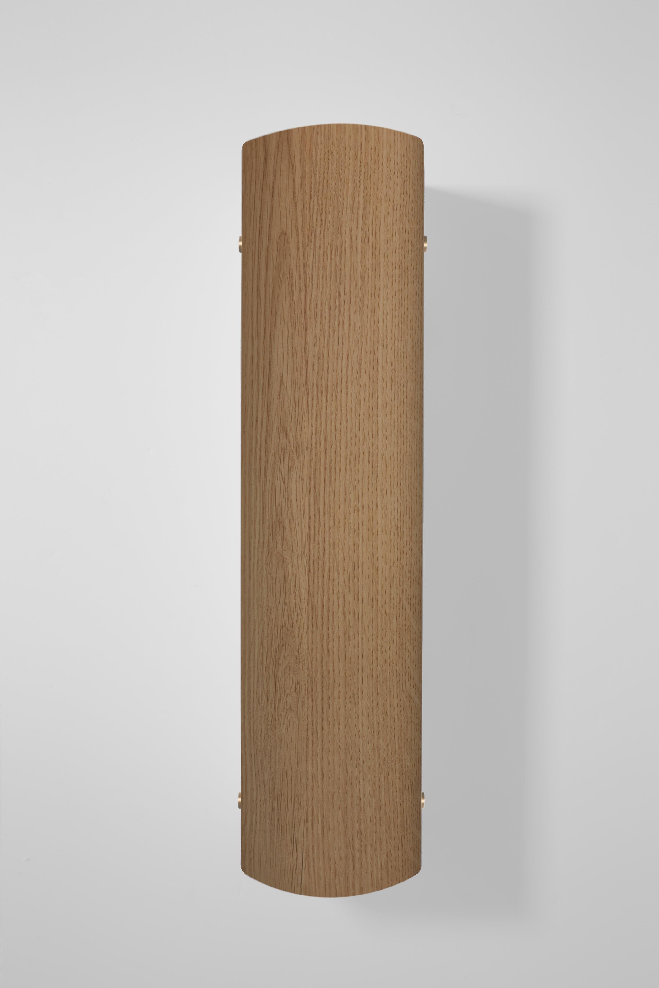Orphan work 101W Sconce
Shown in oak with brushed brass.
Available in natural oak with brushed or blackened brass.
Measures: 19” H x 4 3/4” W x 4 1/2” D
Wall or ceiling mount
Vertical or horizontal
Plug-in by request
UL approved
Holds (2) 60W