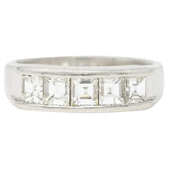 Contemporary 1.02 Carats Step Cut Diamond Platinum Channel Band Ring