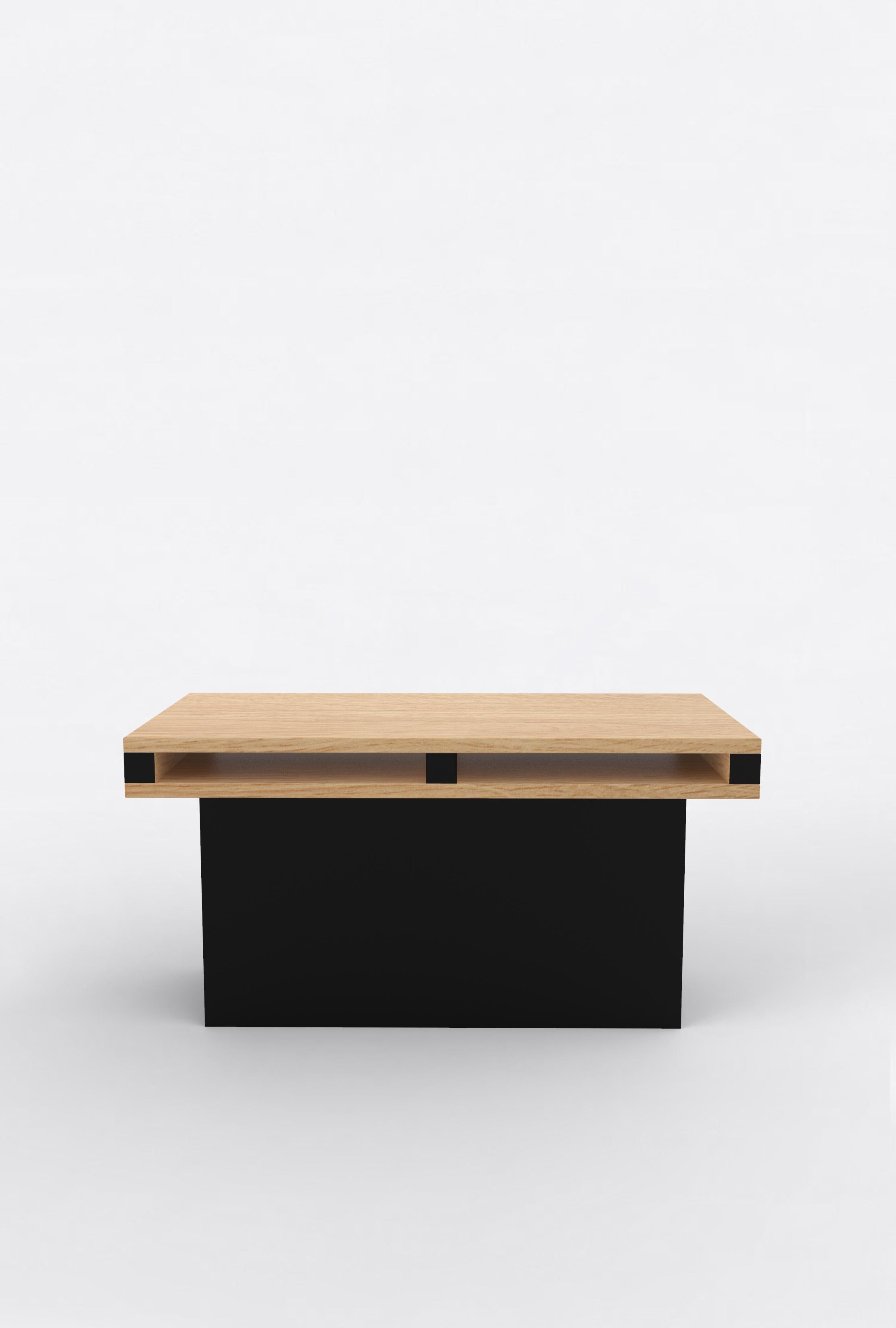 Orphan work 102 End Table
Shown in oak and black.
Available in natural oak with painted base.
Measures: 31” L x 15” D x 15” H

Orphan work is designed to complement in the heart of Soho, New York City. Each piece is handmade in New York and Los